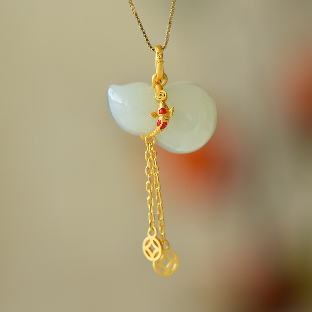 An Exquisite Sterling Silver-Gold Plated Inlaid White Jade Pendant: An Exquisite Sterling Silver-Gold Plated Inlaid White Jade Pendant 纯银镀金镶白玉吊坠