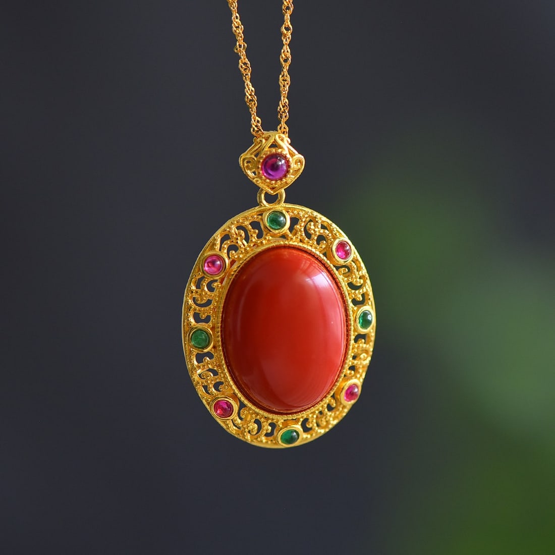 An Exquisite Sterling Silver-Gold Plated Inlaid Cinnabar Pendant: An Exquisite Sterling Silver-Gold Plated Inlaid Cinnabar Pendant,Size:0.6inx0.8in 纯银镀金镶朱砂吊坠