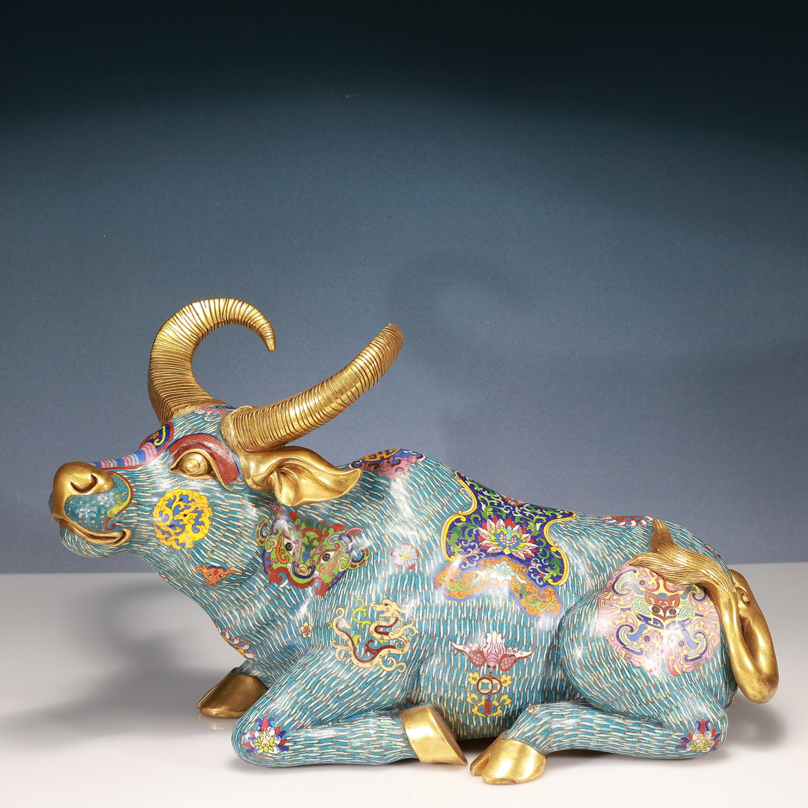 A Huge Cloisonne Beast-Face and Dragon Pattern Buffalo Ornament: Estimated Value:17000-34000 A Huge Cloisonne Beast-Face and Dragon Pattern Buffalo Ornament,Qing Dynasty, China,Qianlong Four-character Mark,Size:20.5inx10.2inx13.4in,Weight:17200g