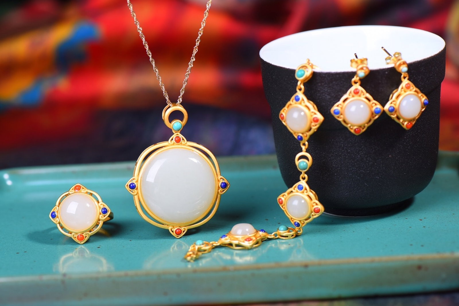 A Set of Fine Sterling Silver-Gold Plated Inlaid White Jade Jewelrys: Estimated Value:1200-2400 A Set of Fine Sterling Silver-Gold Plated Inlaid White Jade Jewelrys,Size:(Ring)12mmx12mm,(Earrings)8mmx8mm,(Pendant)25mmx25mm,(Bracelet)8mmx8mm