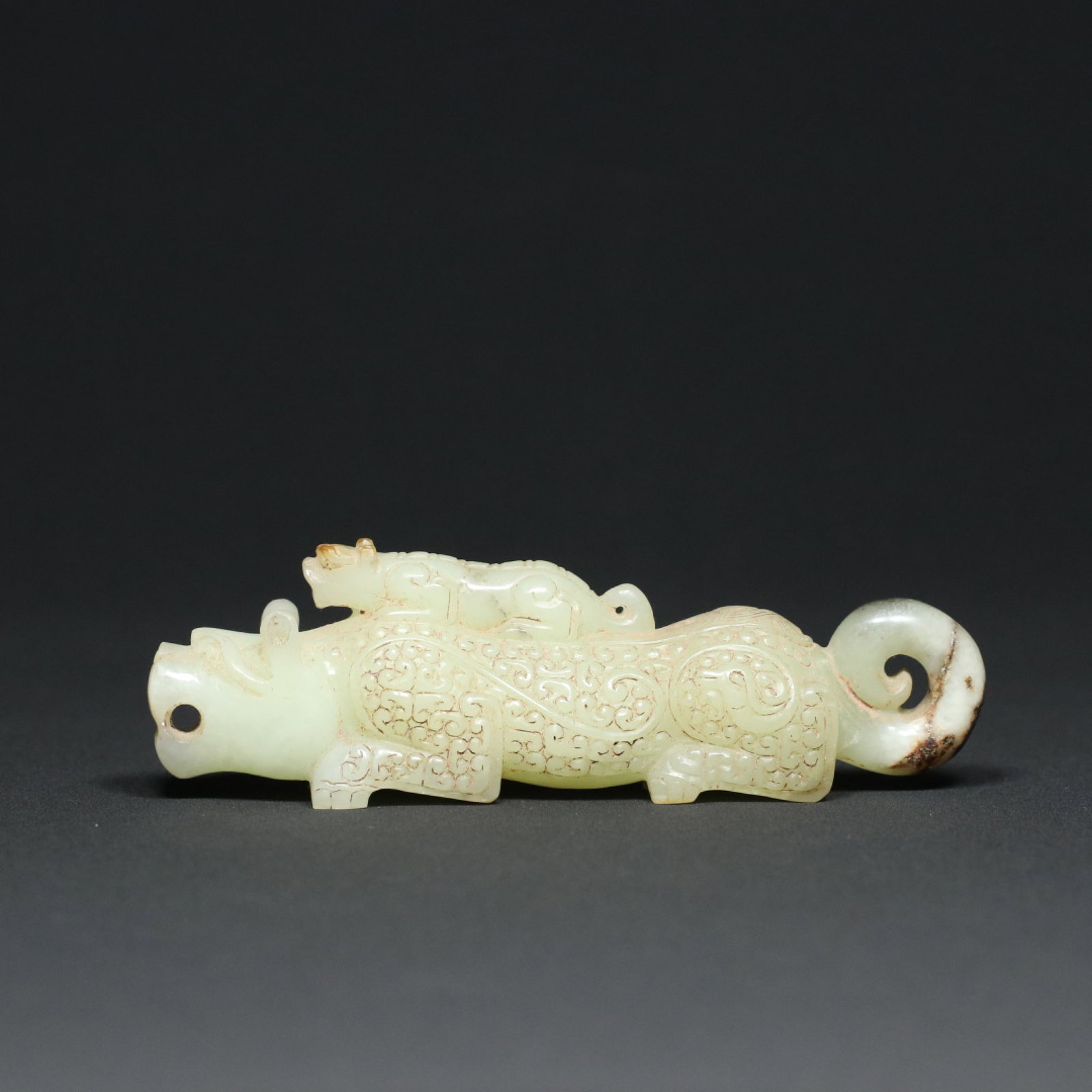 An Exquisite White Jade Ruyi Pattern Tiger Ornament (1 of 9)