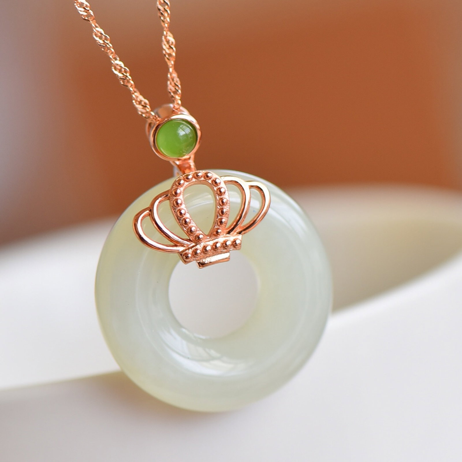 An Exquisite Sterling Silver-Gold Plated Inlaid White Jade Pendant,Inlaid Jasper: Estimated Value:400-800 An Exquisite Sterling Silver-Gold Plated Inlaid White Jade Pendant,Inlaid Jasper,Size:25mmx25mm