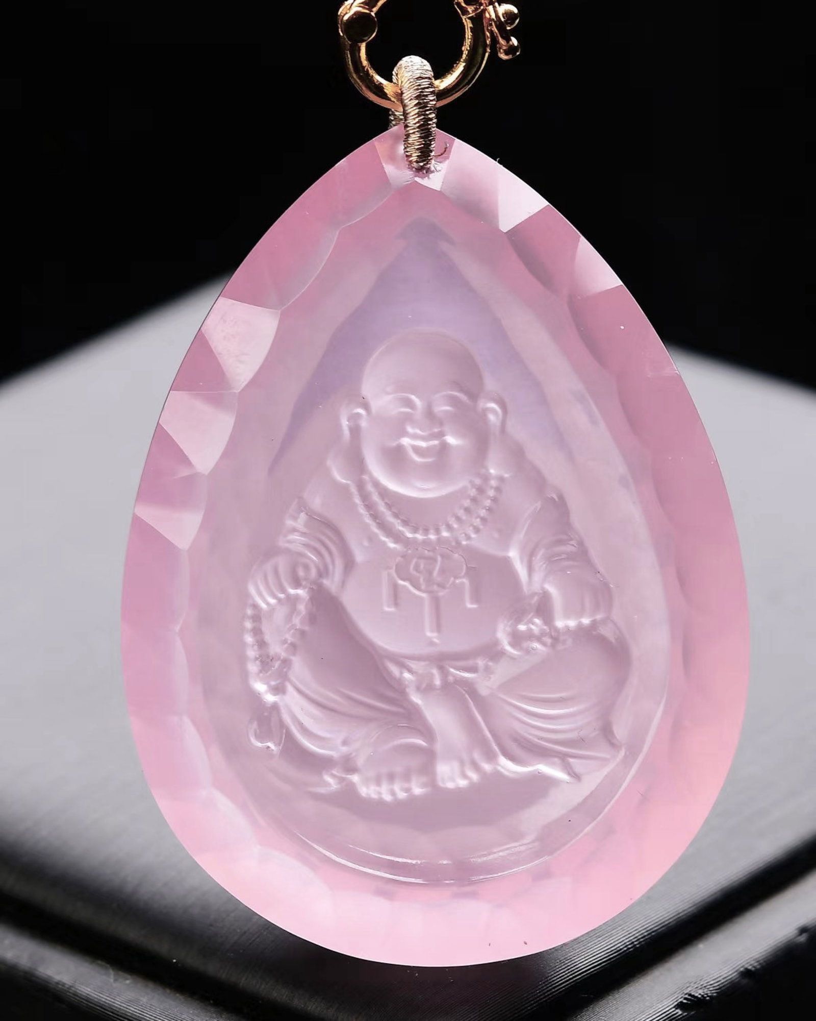 An Exquisite Crystal Statue of Maitreya Buddha Pattern Pendant: Estimated Value:2400-4800 An Exquisite Crystal Statue of Maitreya Buddha Pattern Pendant,Size:52mmx38mmx11mm,Weight:67g 水晶弥勒佛像纹吊坠