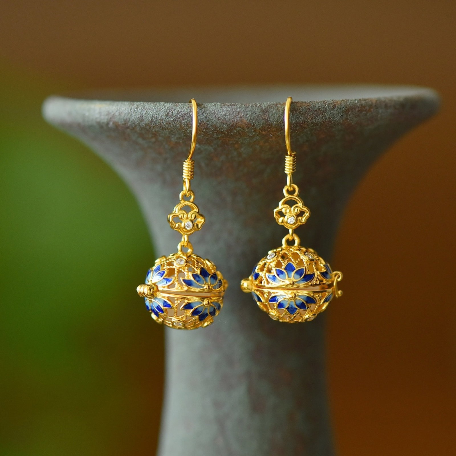 A Pair of Exquisite Sterling Silver-Gold Plated Inlaid White Jade Enamel Earrings: Estimated Value:200-400 A Pair of Exquisite Sterling Silver-Gold Plated Inlaid White Jade Enamel Earrings,Size:8mmx8mm 一对纯银镀金镶白玉珐&