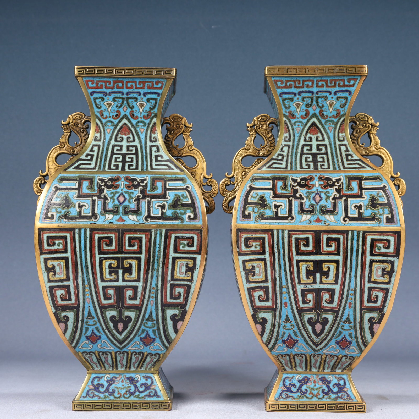A Pair of Rare Cloisonne Chi-Dragon Pattern Dragon-Ears Vases: Estimated Value:26000-52000 A Pair of Rare Cloisonne Chi-Dragon Pattern Dragon-Ears Vases,Qing Dynasty, China,Qianlong Six-character Mark,Size:5.9inx12.6in,Weight:6100g 一对景泰