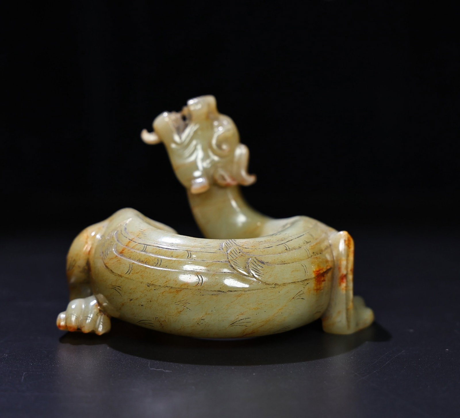 An Exquisite White Jade Dragon Ornament: Estimated Value:3600-7200 An Exquisite White Jade Dragon Ornament,Qing Dynasty,China,Size:101mmx125mmx85mm,Weight:638g 白玉龙摆件,中国清代