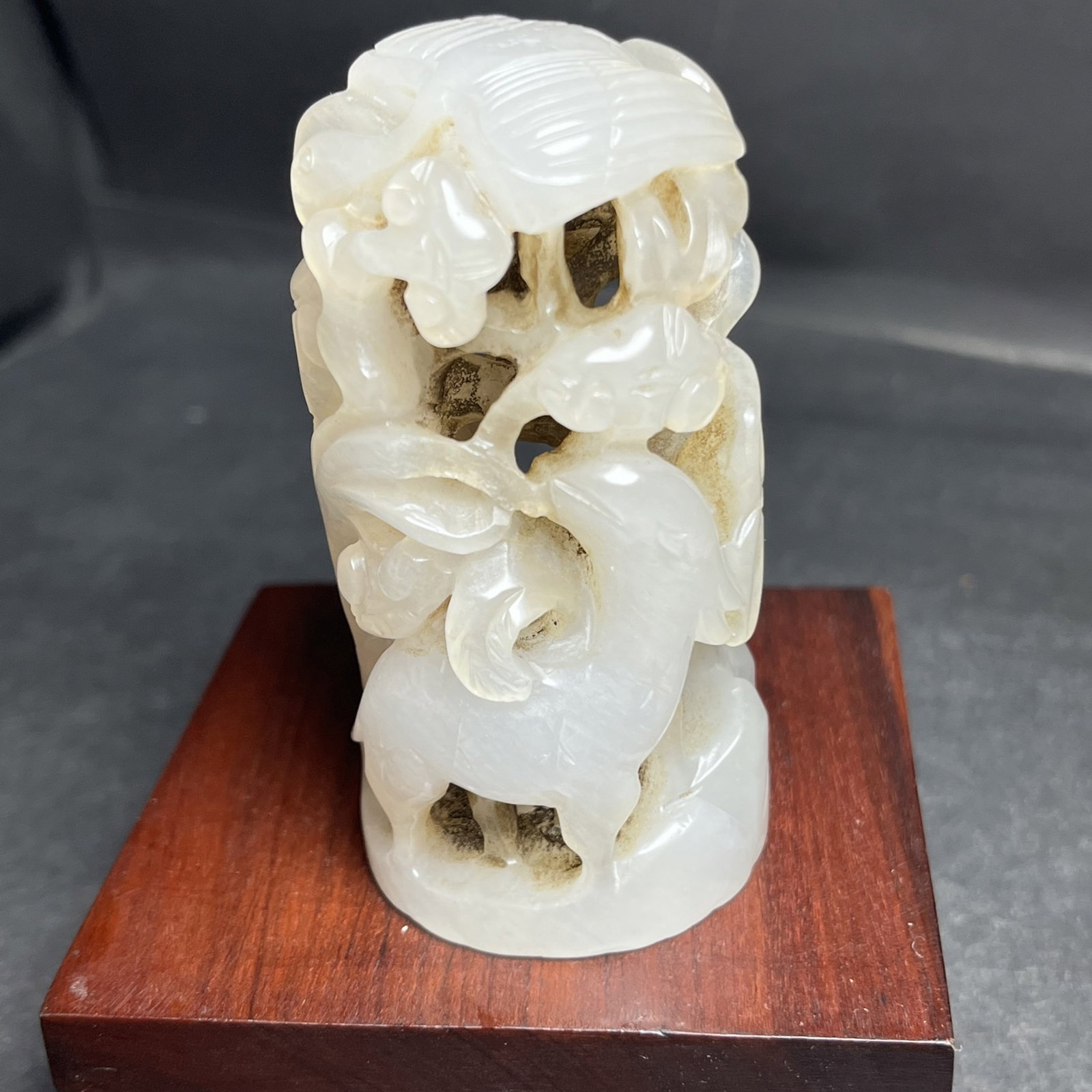An Exquisite White Jade Hollow Deer and Crane Pattern Ornament: Estimated Value:800-1600 An Exquisite White Jade Hollow Deer and Crane Pattern Ornament,Qing Dynasty,China,Size:39mmx77mm,Weight:116g