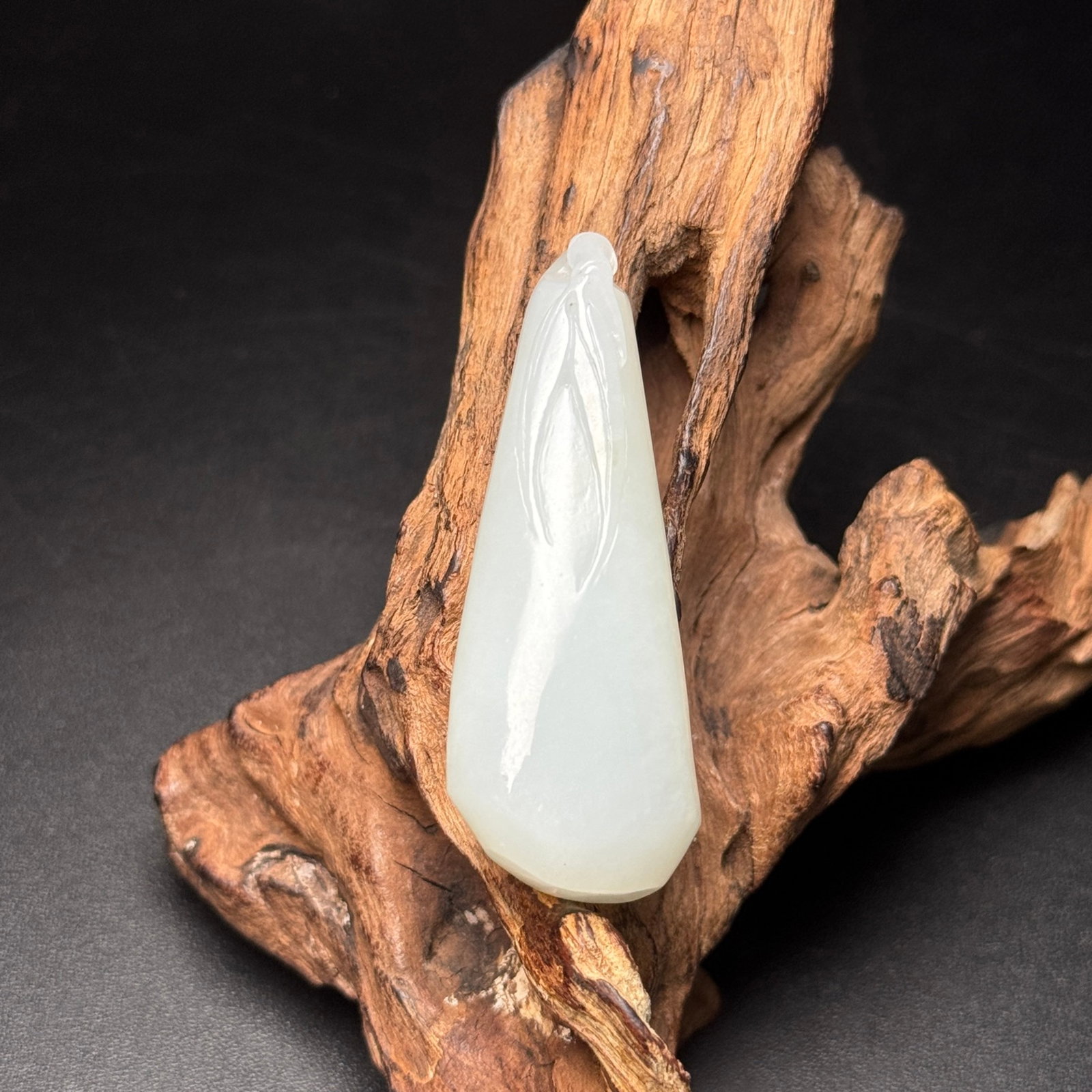 An Exquisite White Jade Bamboo Pattern Pendant: Estimated Value:800-1600 An Exquisite White Jade Bamboo Pattern Pendant,Qing Dynasty,China,Size:58mmx21mmx14mm,Weight:28g