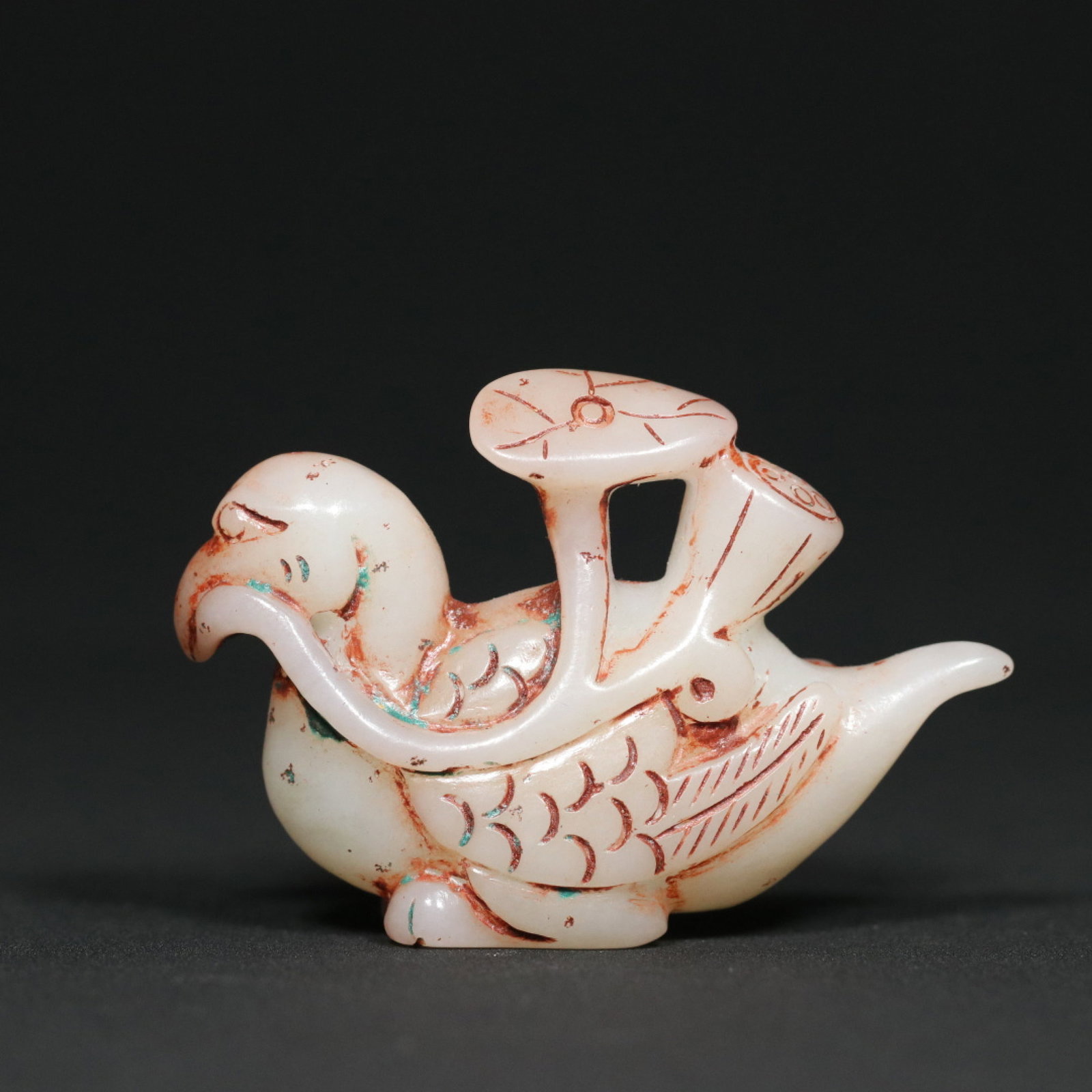 An Exquisite White Jade Goose Pendant: Estimated Value:600-1200 An Exquisite White Jade Goose Pendant,Qing Dynasty,China,Size:2.4inx0.8inx1.6in,Weight:48.5g 白玉鹅挂件,中国清代