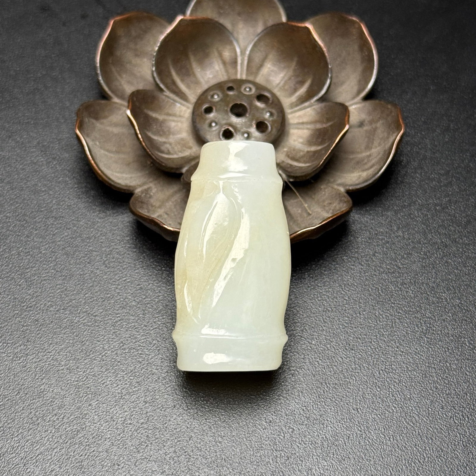 An Exquisite White Jade Bamboo Pattern Pendant: Estimated Value:800-1600 An Exquisite White Jade Bamboo Pattern Pendant,Qing Dynasty,China,Size:39mmx20mmx13mm,Weight:21g