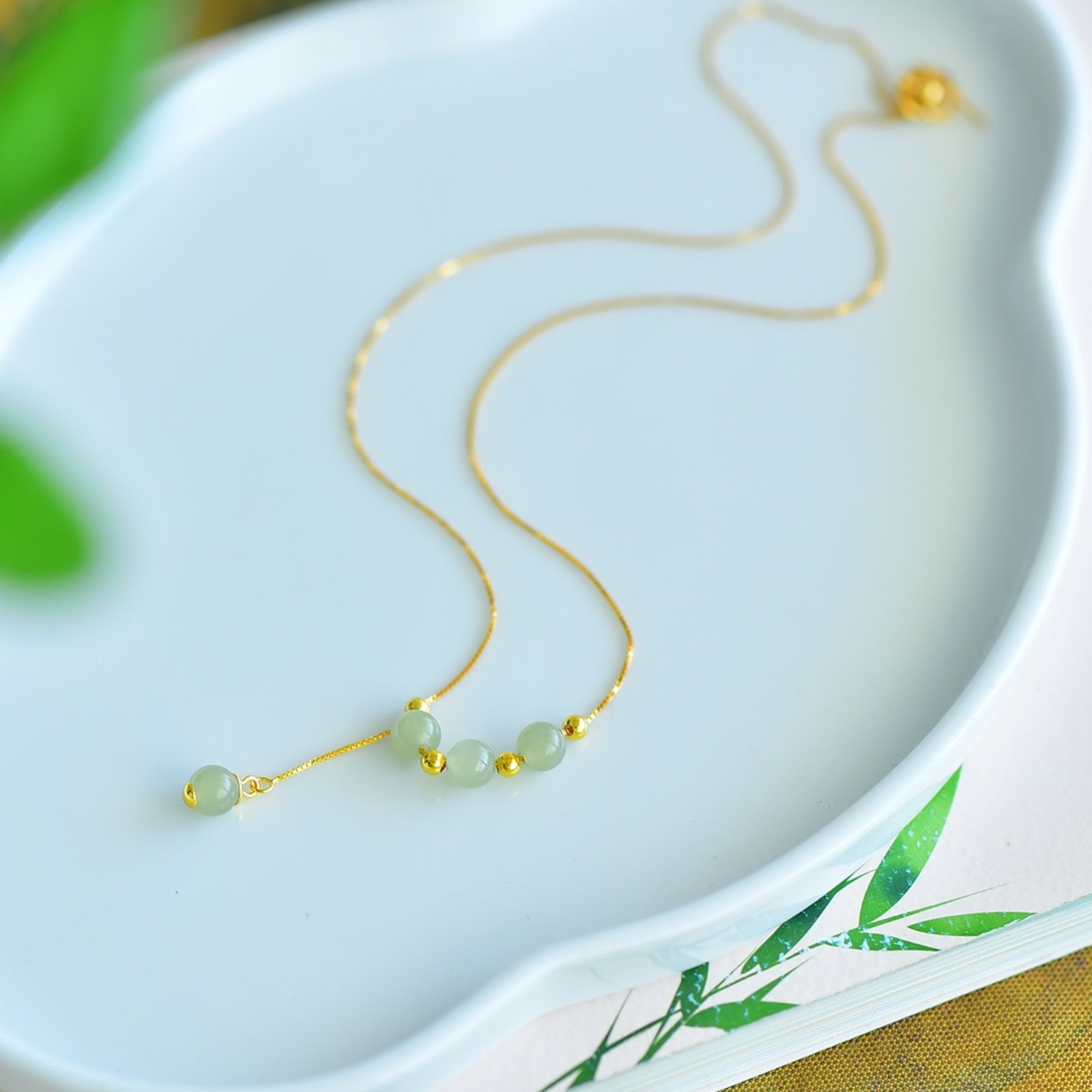 An Exquisite Sterling Silver-Gold Plated Inlaid Greenish Jade Pendant: Estimated Value:200-400 Sterling Silver-Gold Plated Inlaid Greenish Jade Pendant , Size :6mmx6mm