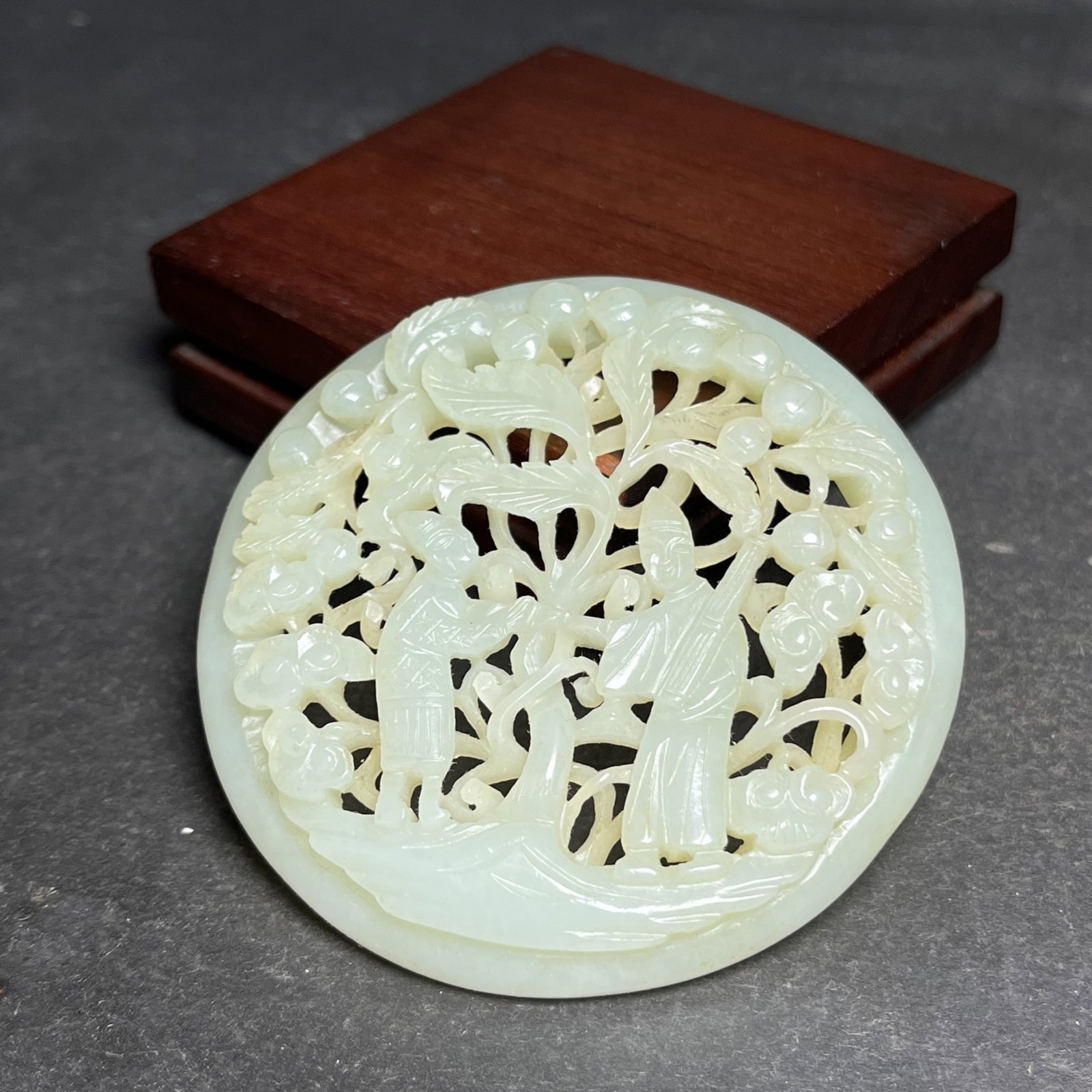 An Exquisite White Jade Hollow Character and Story Pattern Pendant: Estimated Value:1400-2800 An Exquisite White Jade Hollow Character and Story Pattern Pendant,Qing Dynasty,China,Size:78mmx11mm,Weight:70g