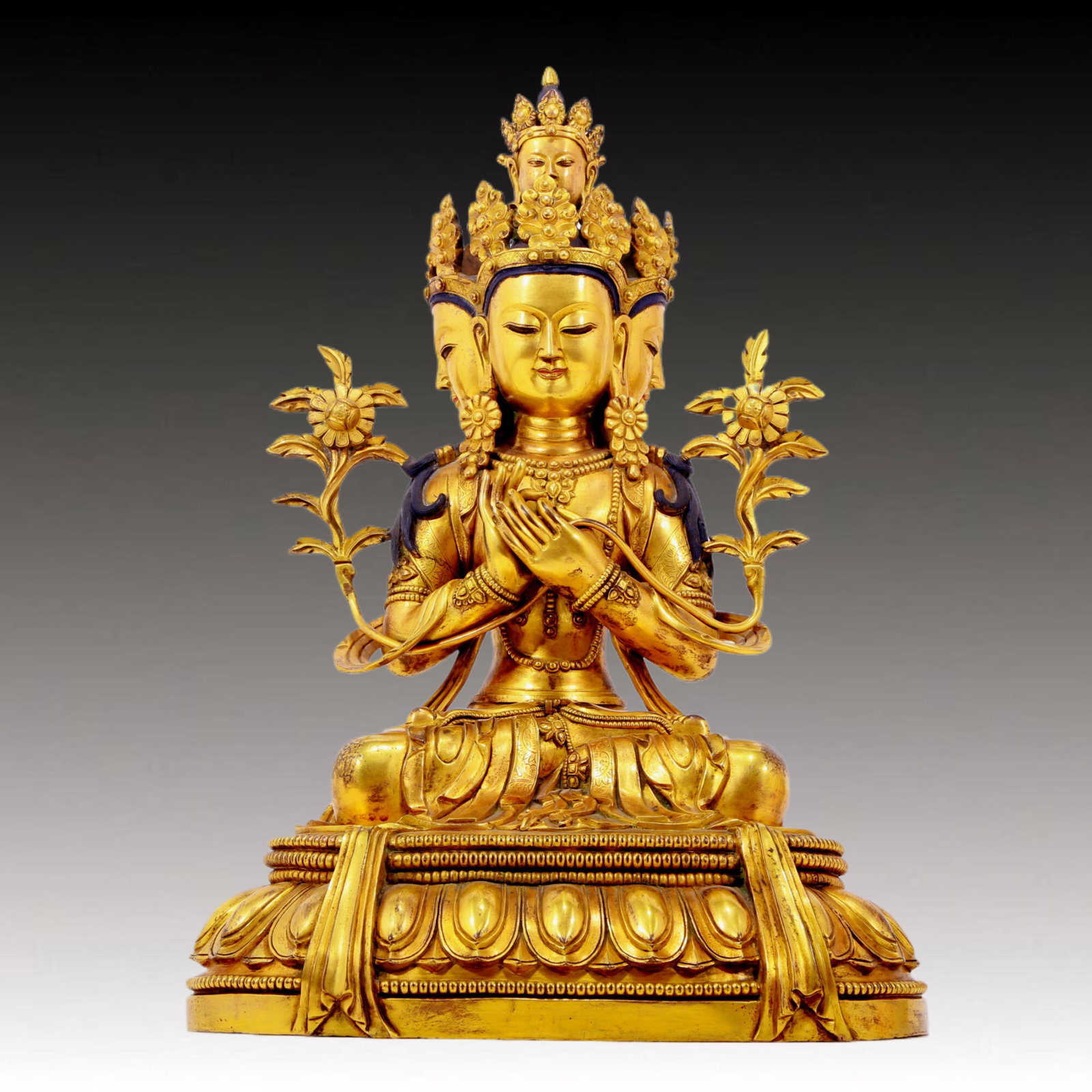 A solemn gilt bronze statue of Bodhisattva: Estimated Value:11000-22000 A gilt-bronze Bodhisattva statues, Qing Dynasty, China. The Bodhisattva has a graceful and peaceful posture. His face is solemn and kind, and his eyes are deep, as if he