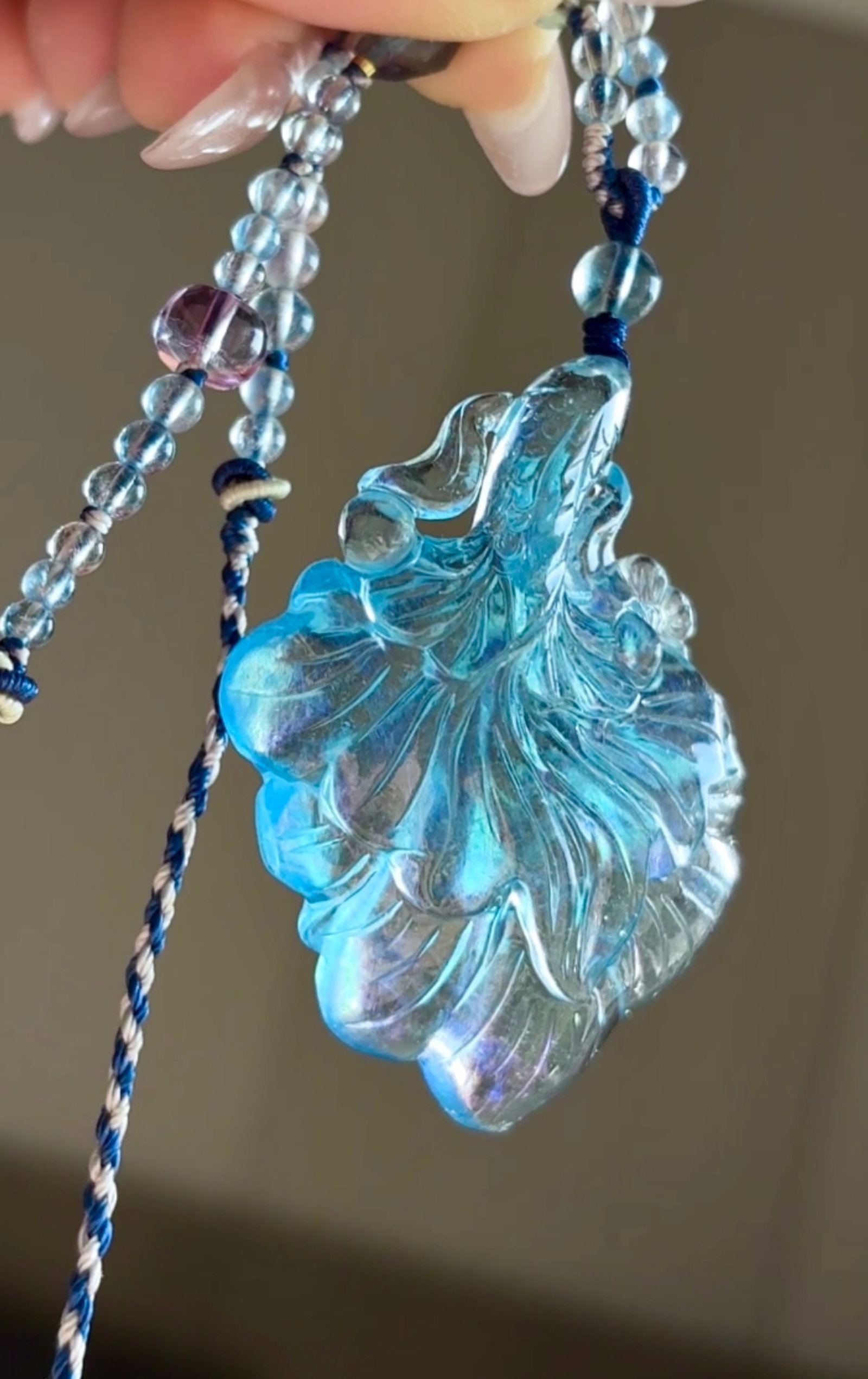 An Exquisite Aquamarine Goldfish Pendant: Estimated Value:2200-4400 An Exquisite Aquamarine Goldfish Pendant,Size:53mmx42mmx12.8mm,Total Weight:27.8g 海蓝宝金鱼吊坠