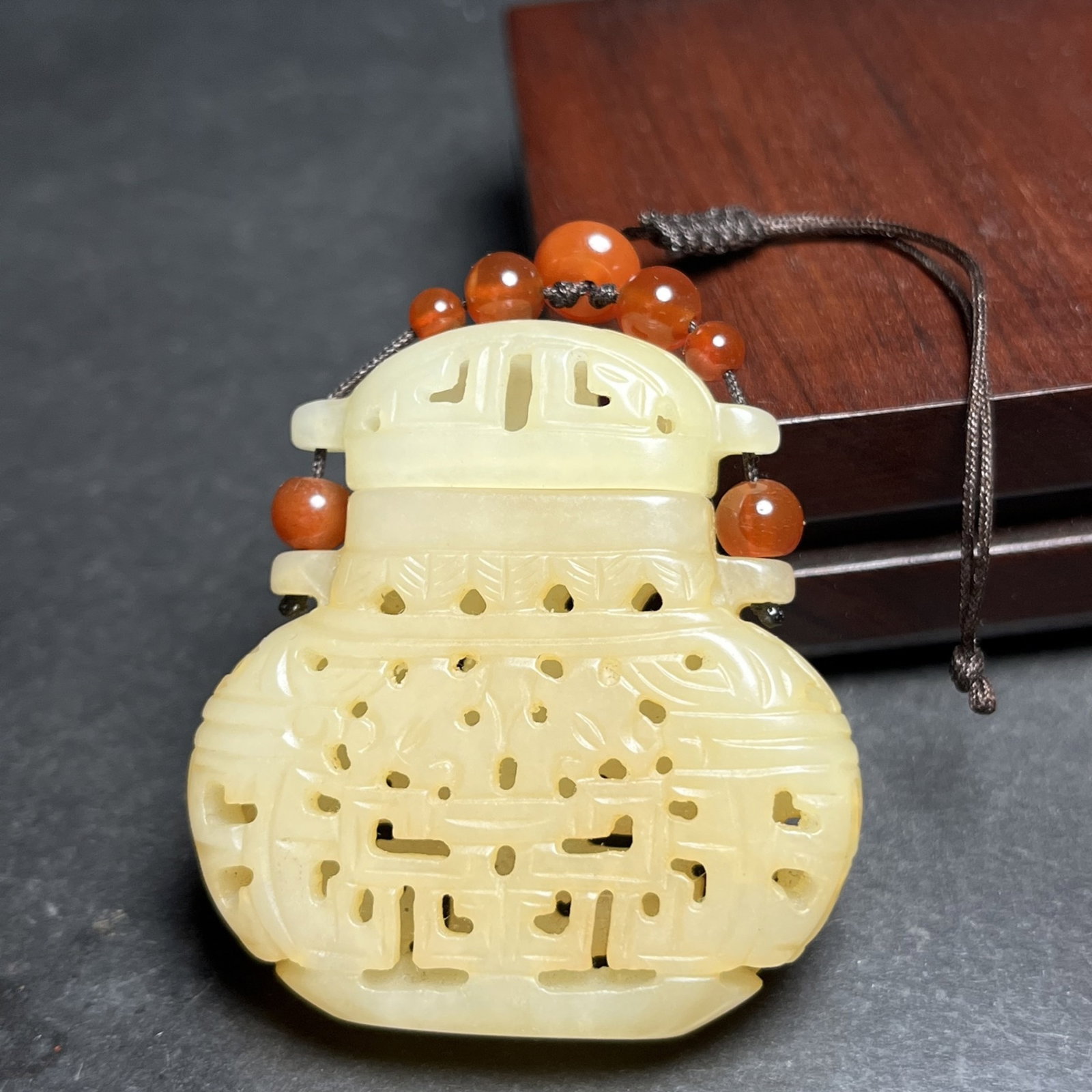 An Exquisite White Jade Hollow Pendant: Estimated Value:800-1600 An Exquisite White Jade Hollow Pendant,Qing Dynasty,China,Size:50mmx13mmx48mm,Weight:34g 白玉镂空挂件,中国清代