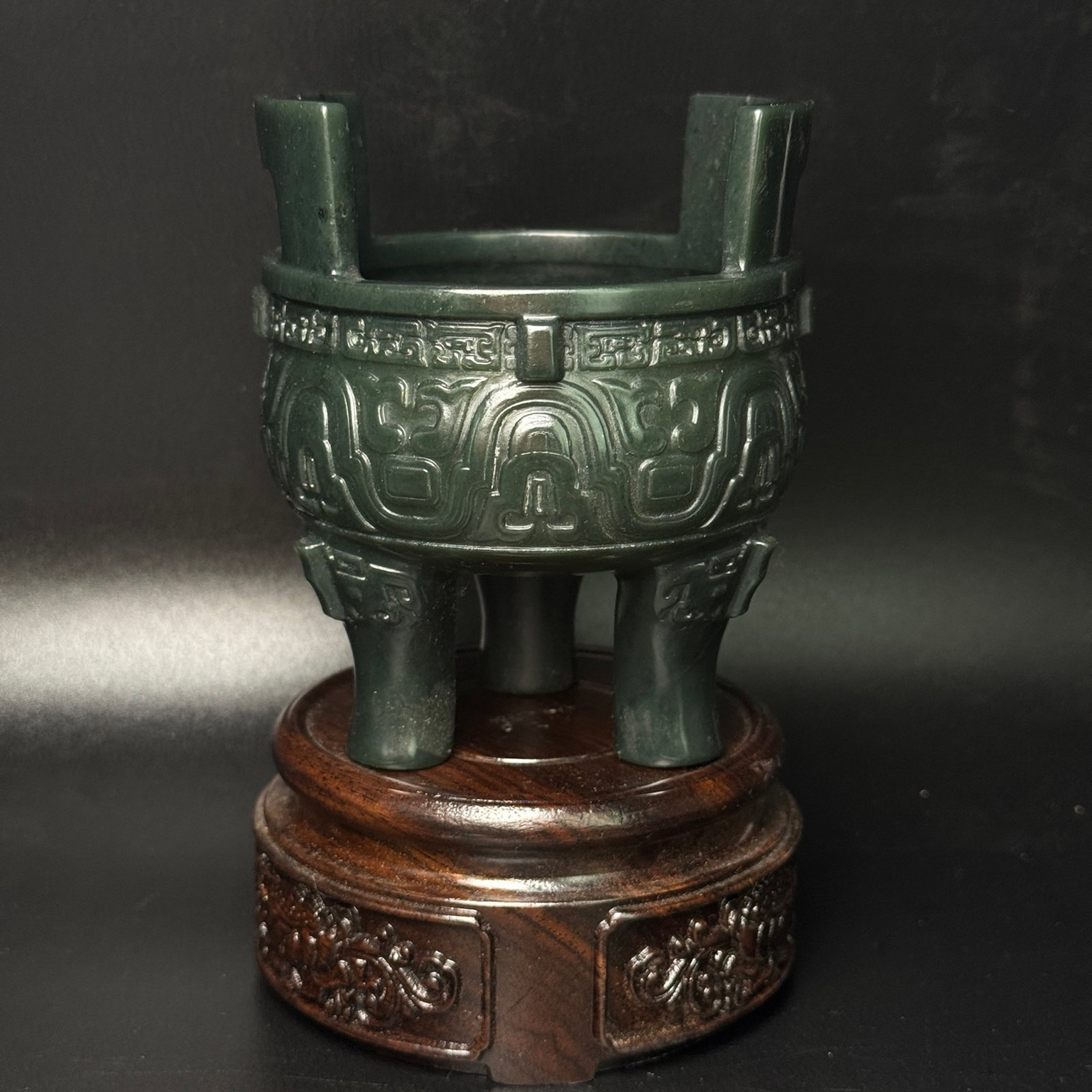 An Exquisite Greenish Jade Beast-Face Pattern Double-Ears Tripod Censer: Estimated Value:2400-4800 An Exquisite Greenish Jade Beast-Face Pattern Double-Ears Tripod Censer,Qing Dynasty,China,Size:94mmx94mmx108mm,Weight:265g