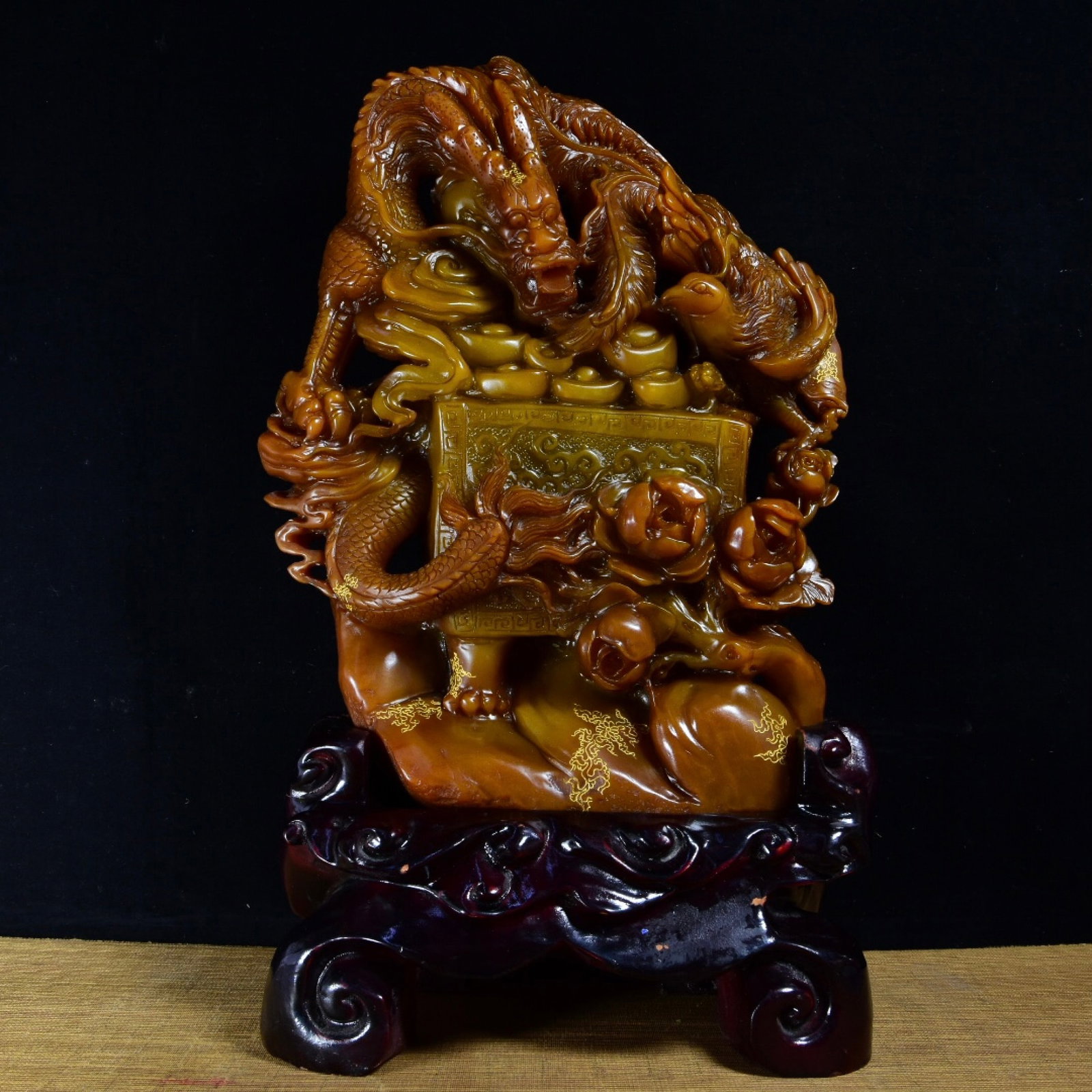 A Huge Tianhuang Stone Dragon and Phoenix Pattern Ornament: Estimated Value:4800-9600 A Huge Tianhuang Stone Dragon and Phoenix Pattern Ornament,Qing Dynasty,China,Yuxuan Mark,Size:16.7inx10.2inx3.5in,Weight:6740g 田黄石龙凤ಬ