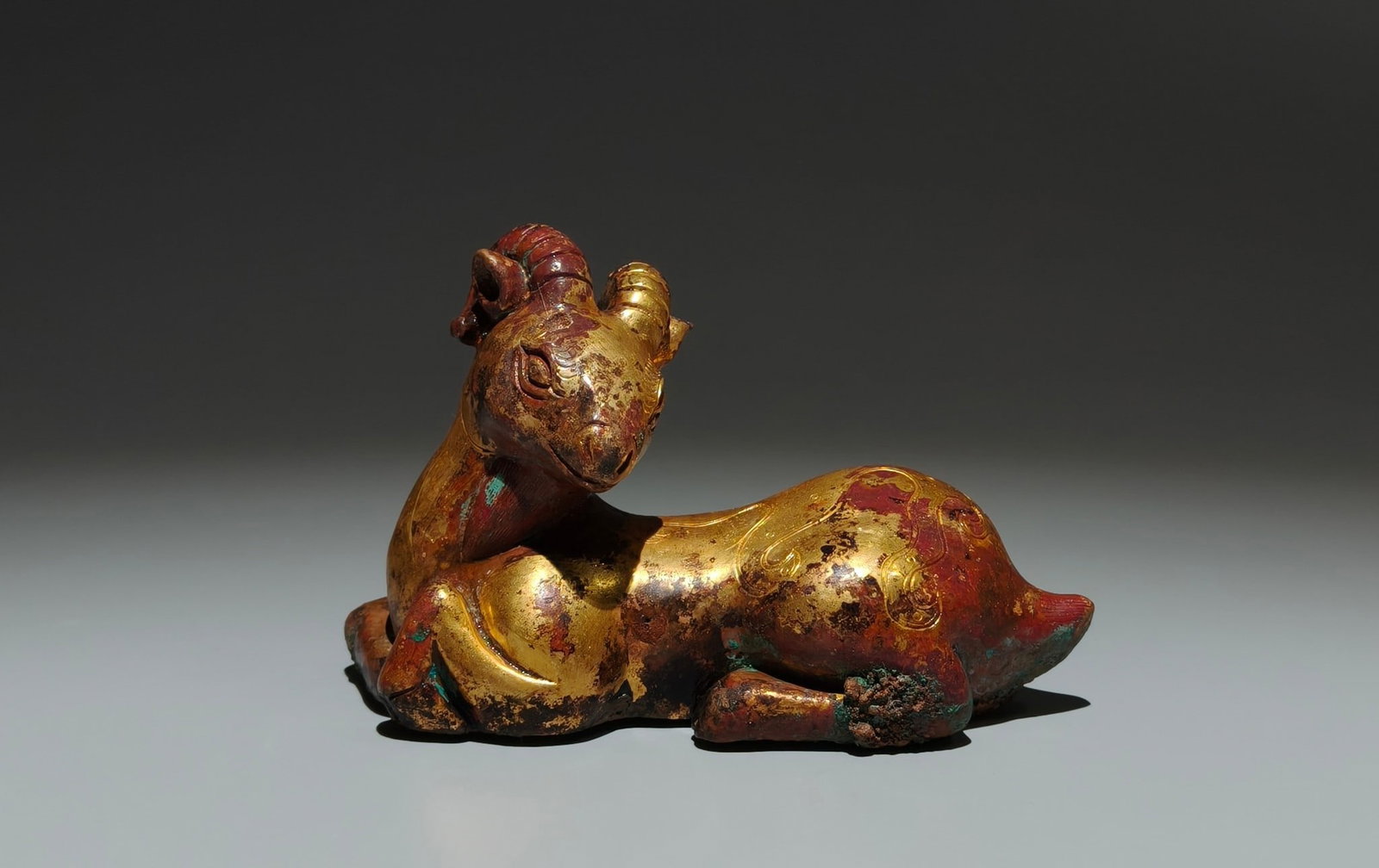 An Exquisite Gilt Bronze Sheep Ornament: Estimated Value:1500-3000 An Exquisite Gilt Bronze Sheep Ornament,Han Dynasty,China,Size:3.1inx5.1inx2in 铜鎏金羊摆件,中国汉代