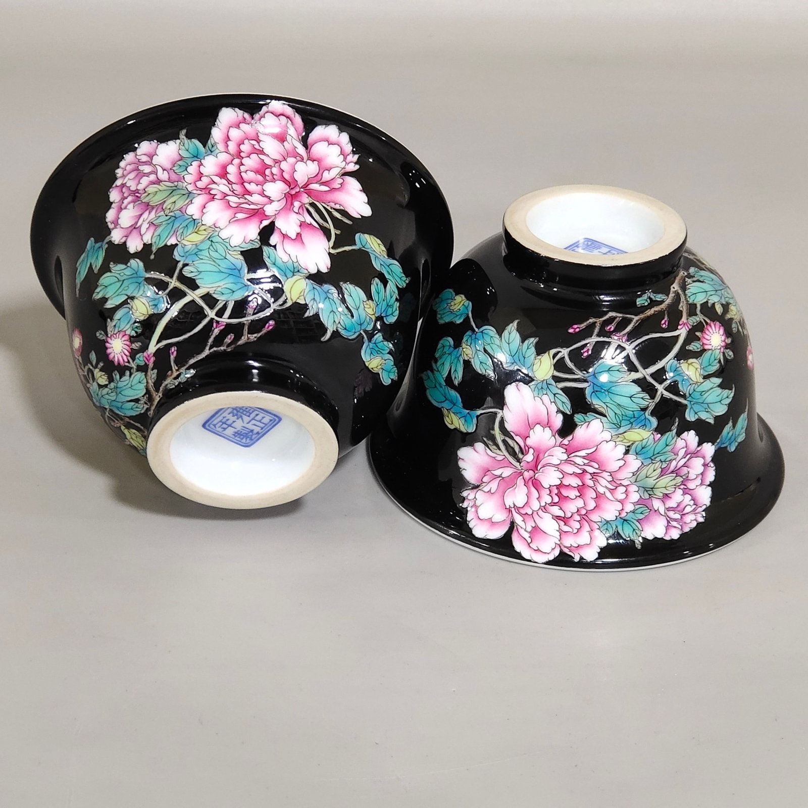 A Pair of Exquisite Enamel Black Glazed Peony Pattern Cups,With Poem: Estimated Value:2400-4800 A Pair of Exquisite Enamel Black Glazed Peony Pattern Cups,With Poem,Qing Dynasty,China,Yongzheng Four-character Mark,Size:2inx3.2in