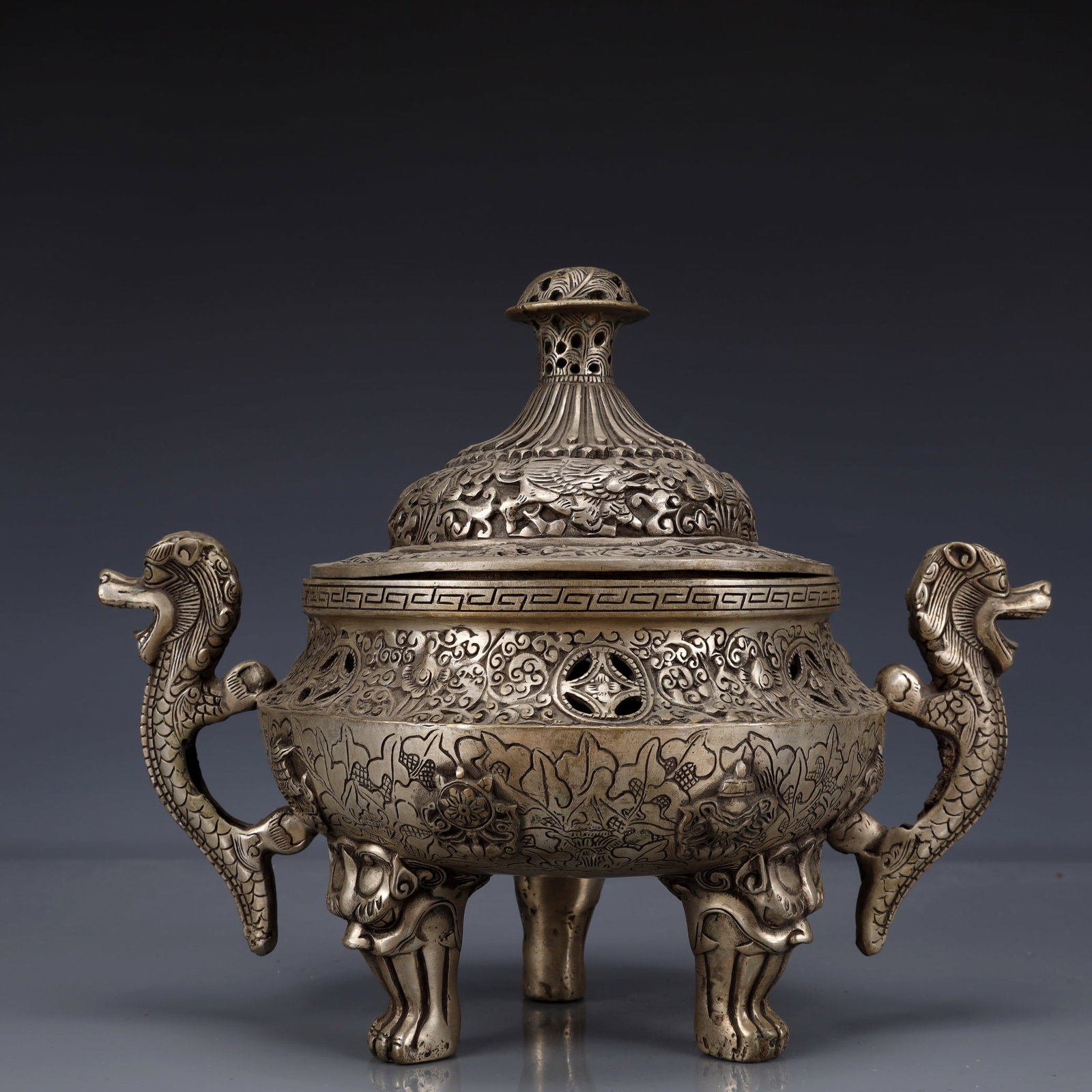 An Exquisite Silver-Plated Bronze Auspicious Beast Pattern Double-Ears and Tripod Censer: Estimated Value:1800-3600 An Exquisite Silver-Plated Bronze Auspicious Beast Pattern Double-Ears and Tripod Censer,The Republic of China,Size:11inx6.7inx8.7in,Weight:2250g
