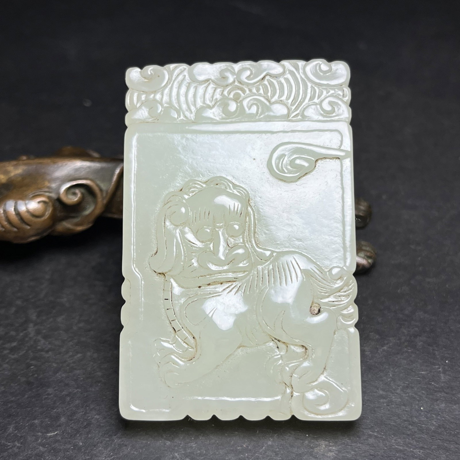 An Exquisite White Jade Lion Pattern Pendant,With Poem: Estimated Value:680-1360 An Exquisite White Jade Lion Pattern Pendant,With Poem,Qing Dynasty,China,Size:39mmx9mmx60mm,Weight:51g