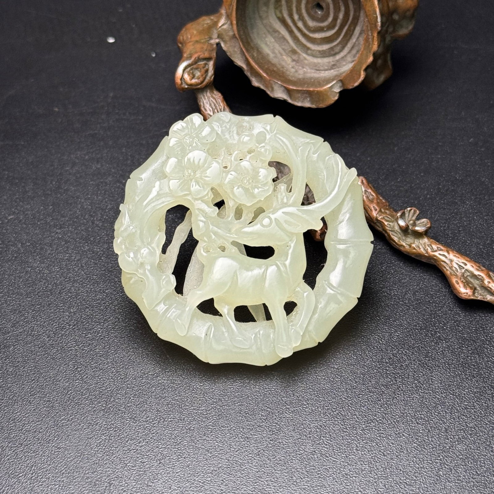 An Exquisite White Jade Flower and Deer Pattern Pendant: Estimated Value:750-1500 An Exquisite White Jade Flower and Deer Pattern Pendant,Qing Dynasty,China,Size:50mmx11mm,Weight:31g