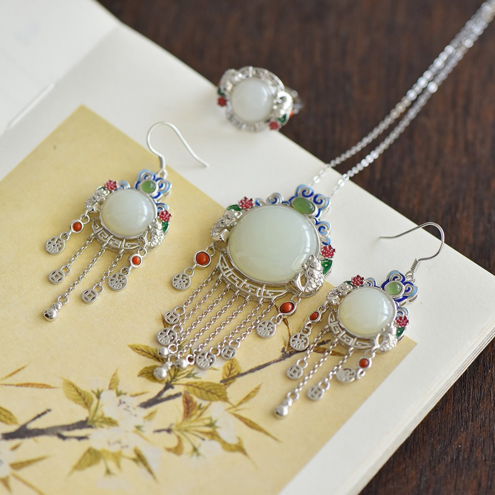 A Set of Fine Sterling Silver Inlaid White Jade Enamel Jewelries: Estimated Value:840-1680 A Set of Fine Sterling Silver Inlaid White Jade Enamel Jewelries 一套纯银镶白玉珐琅首饰