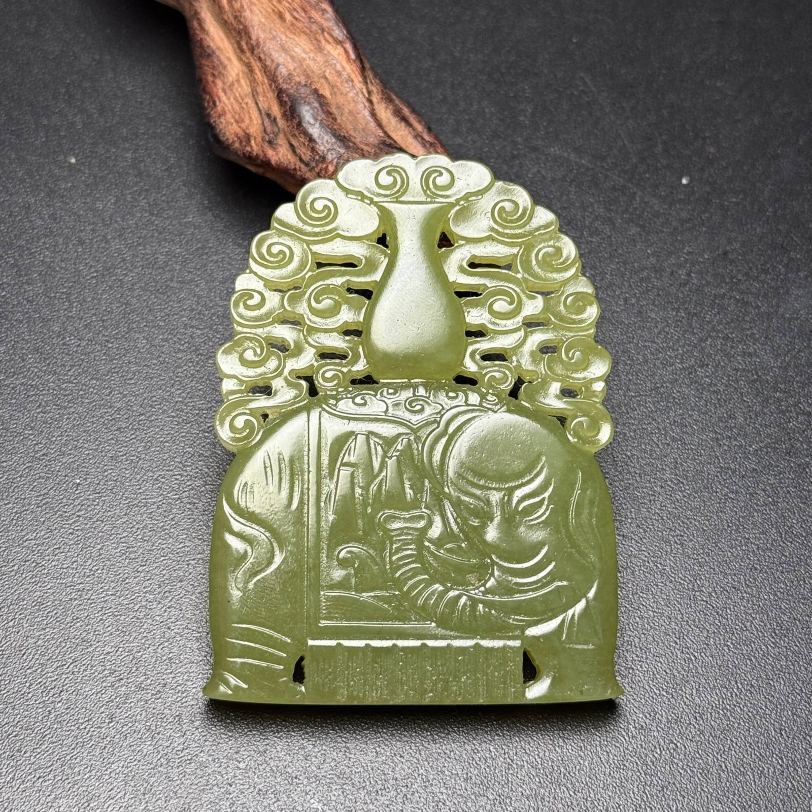 An Exquisite Yellow Jade Auspicious Cloud and Elephant Pattern Pendant: Estimated Value:800-1600 An Exquisite Yellow Jade Auspicious Cloud and Elephant Pattern Pendant,Qing Dynasty,China,Size:61mmx45mmx6mm,Weight:36g