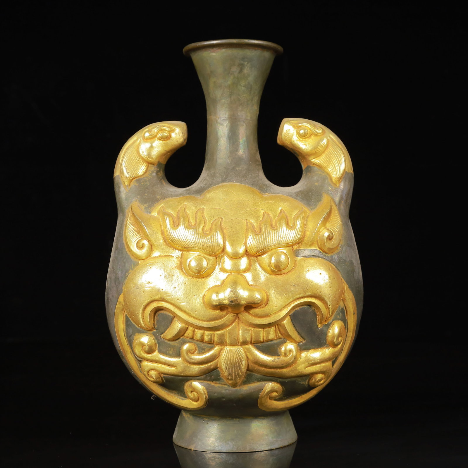 An Exquisite Gilt Silver Beast-Face Pattern Beast-Ears Vase: Estimated Value:1400-2800 An Exquisite Gilt Silver Beast-Face Pattern Beast-Ears Vase,Tang Dynasty,China,Zhenguan Four-Character Mark,Size:5.1inx3.9inx7.9in,Weight:450g