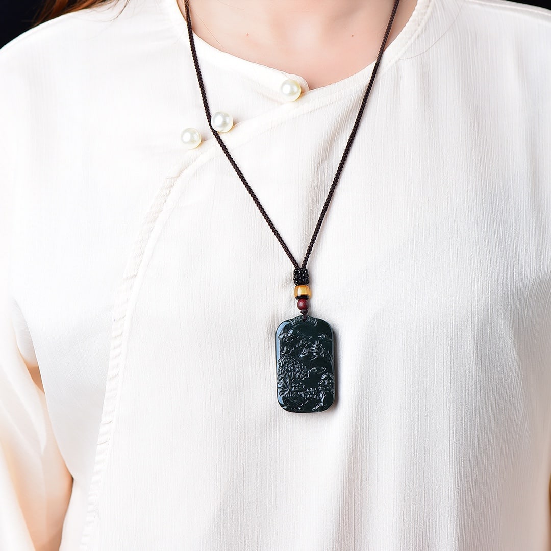 An Exquisite Sapphire Landscape Pattern Pendant: Estimated Value:200-400 An Exquisite Sapphire Landscape Pattern Pendant,Size:30mmx51mm 寓意:意境优美 青玉山水纹牌