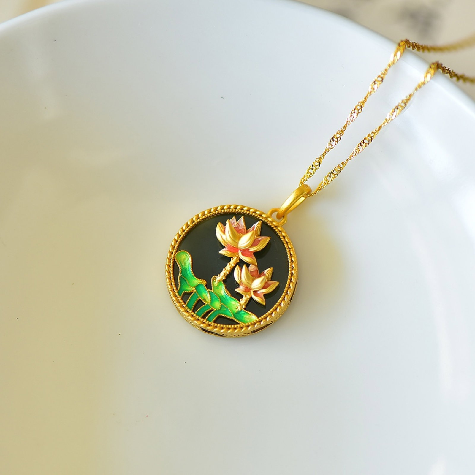 An Exquisite Sterling Silver-Gold Plated Inlaid Greenish Jade Enamel Pendant: Estimated Value:200-400 An Exquisite Sterling Silver-Gold Plated Inlaid Greenish Jade Enamel Pendant,Size:18mmx18mm 纯银镀金镶青玉珐琅吊