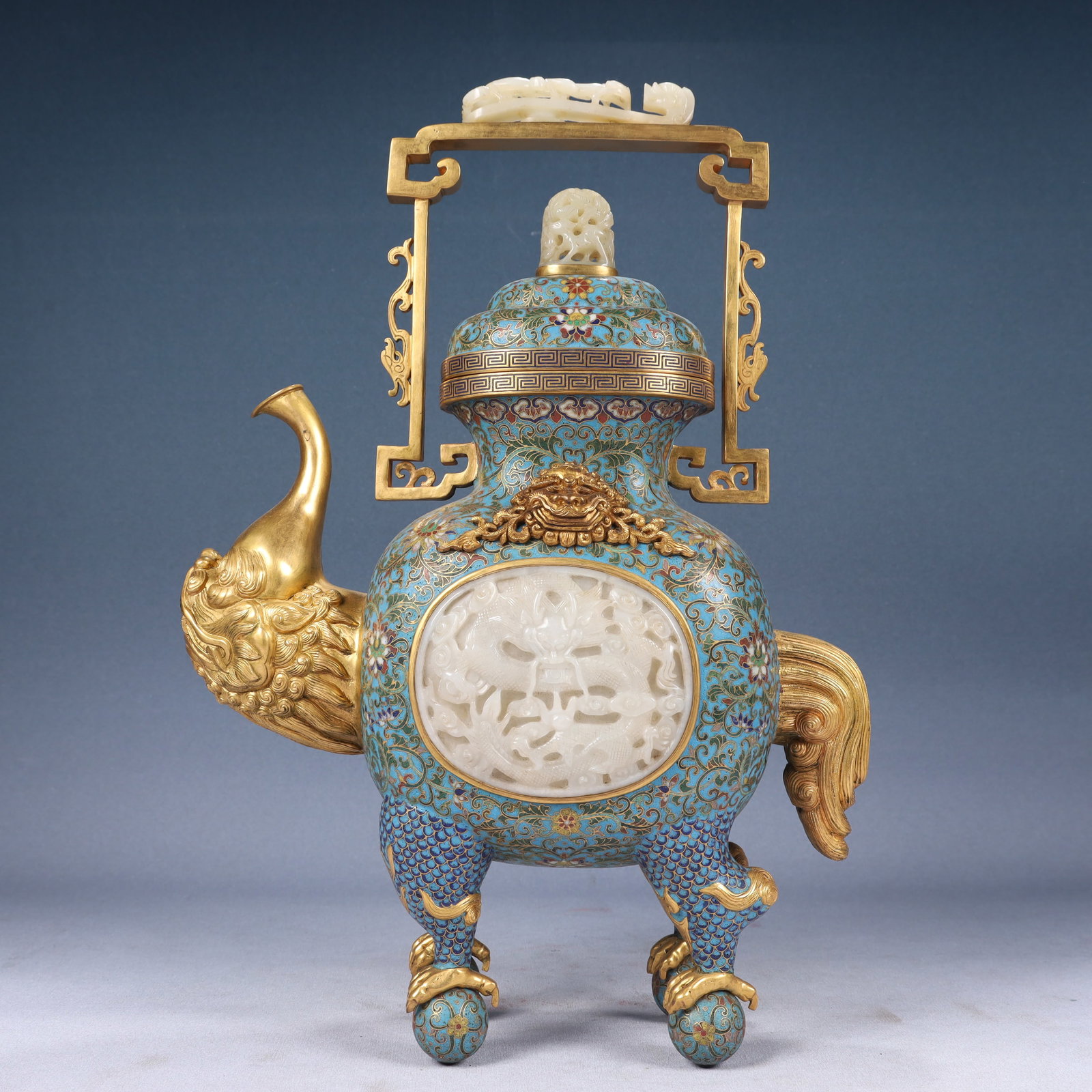A Huge Cloisonne Inlaid White Jade Lotus,Auspicious Cloud and Dragon Pattern Ewer: Estimated Value:45000-90000 A Huge Cloisonne Inlaid White Jade Lotus,Auspicious Cloud and Dragon Pattern Ewer,Qing Dynasty, China,Qianlong Four-character Mark,Size:11inx5.1inx17.3in,Weight:4050g