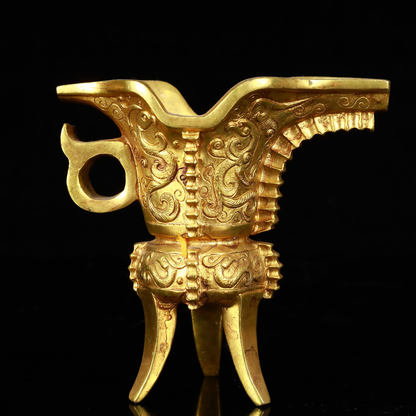 A Rare Gilt Bronze Dragon Pattern Tripod Goblet: Estimated Value:1200-2400 A Rare Gilt Bronze Dragon Pattern Tripod Goblet,The Warring States period in China,Size:4.9inx2.6inx4.7in,Weight:750g