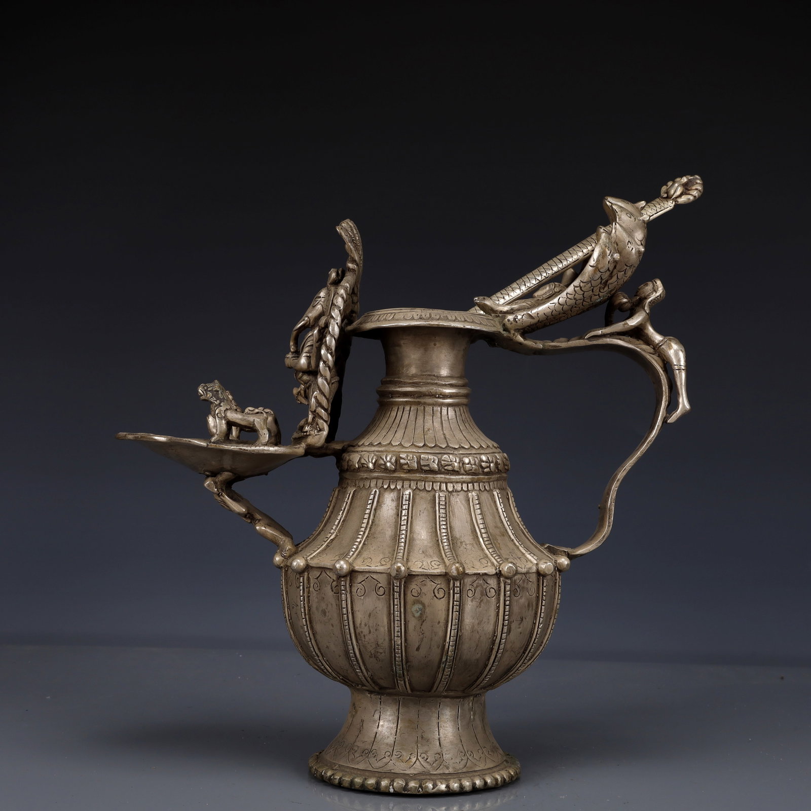 An Exquisite Silver-Plated Bronze Statue of Ganesh Ewer: Estimated Value:2000-4000 An Exquisite Silver-Plated Bronze Statue of Ganesh Ewer,The Republic of China,Size:11inx5.9inx10.6in,Weight:2450g