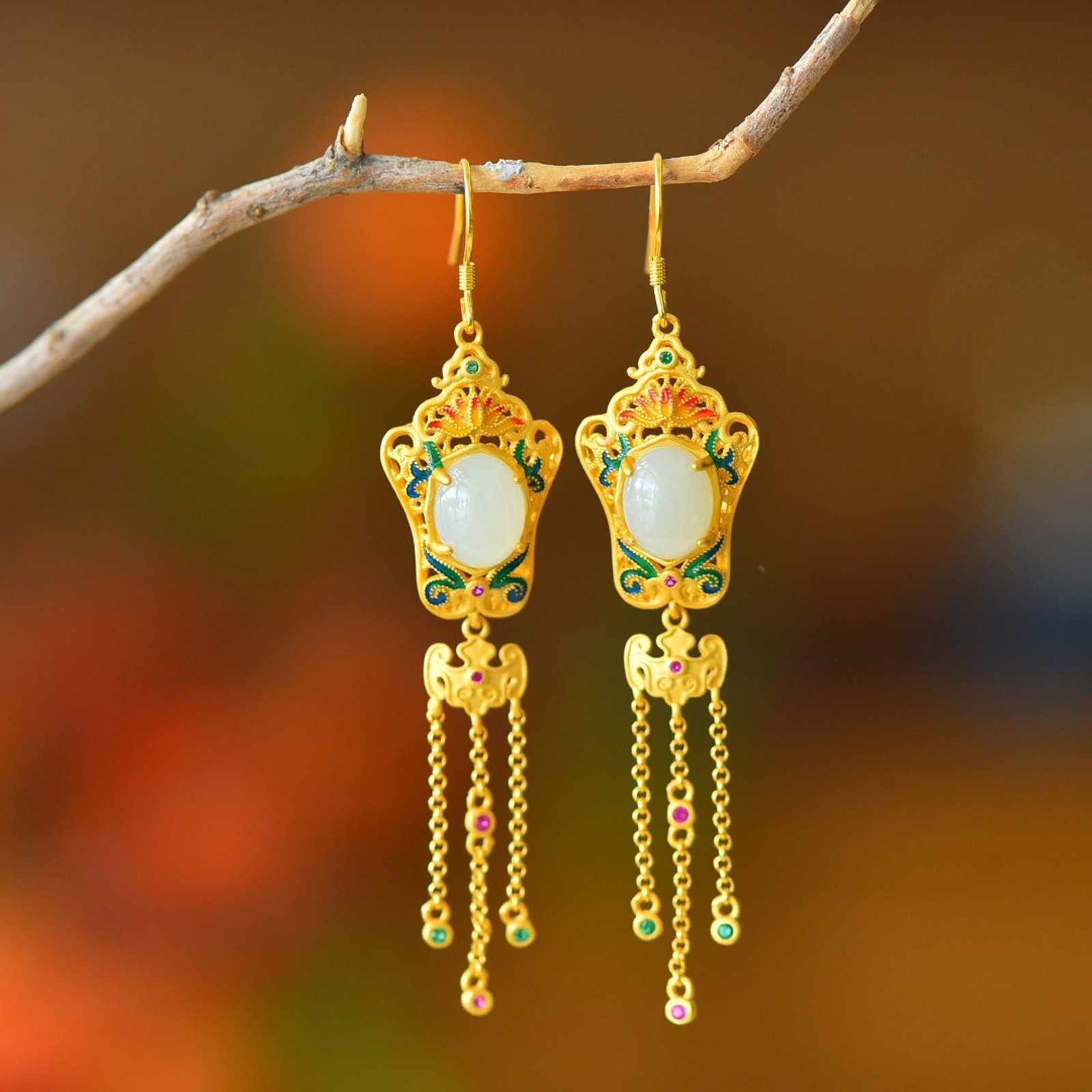 A Pair of Exquisite Sterling Silver-Gold Plated Inlaid White Jade Enamel Earrings: Estimated Value:300-600 A Pair of Exquisite Sterling Silver-Gold Plated Inlaid White Jade Enamel Earrings