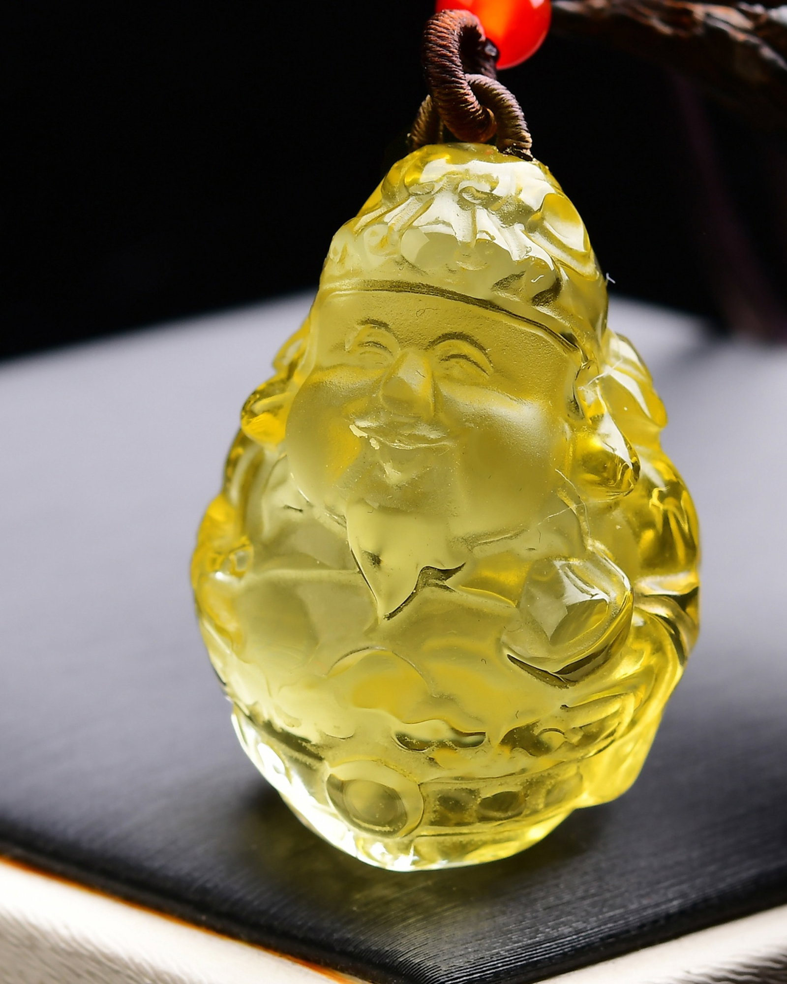 An Exquisite Crystal Statue of Mammon Pendant: Estimated Value:720-1440 An Exquisite Crystal Statue of Mammon Pendant,Size:38mmx28mmx21mm,Weight:32g 水晶财神像吊坠