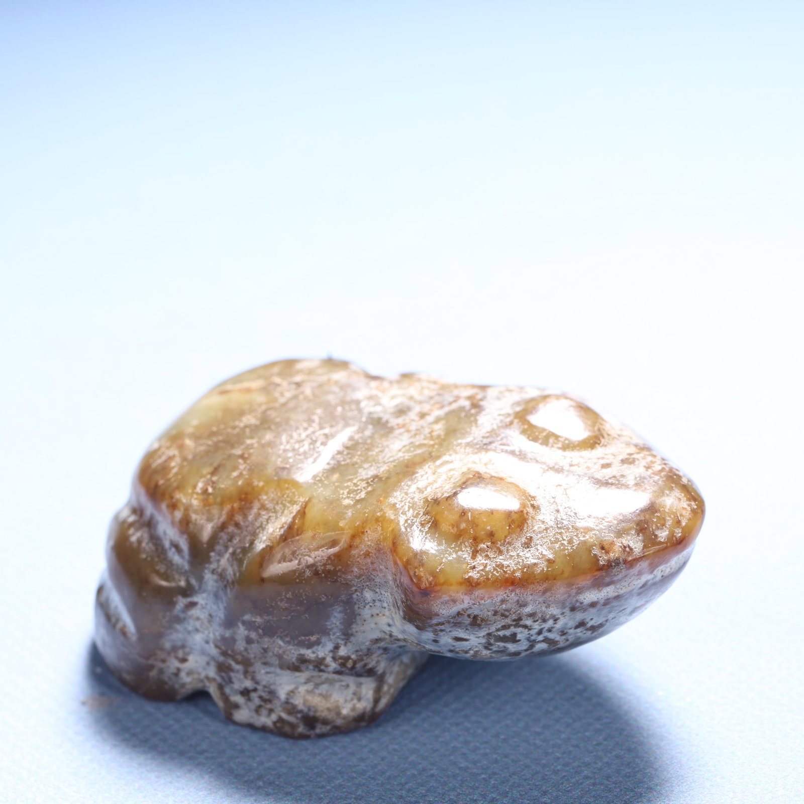 An Archaic Hongshan Culture Yellow Jade Frog Ornament: Estimated Value:300-600 An Archaic Hongshan Culture Yellow Jade Frog Ornament,Ancient Time,China,Size:2.6inx1.5inx0.9in,Weight:113.4g