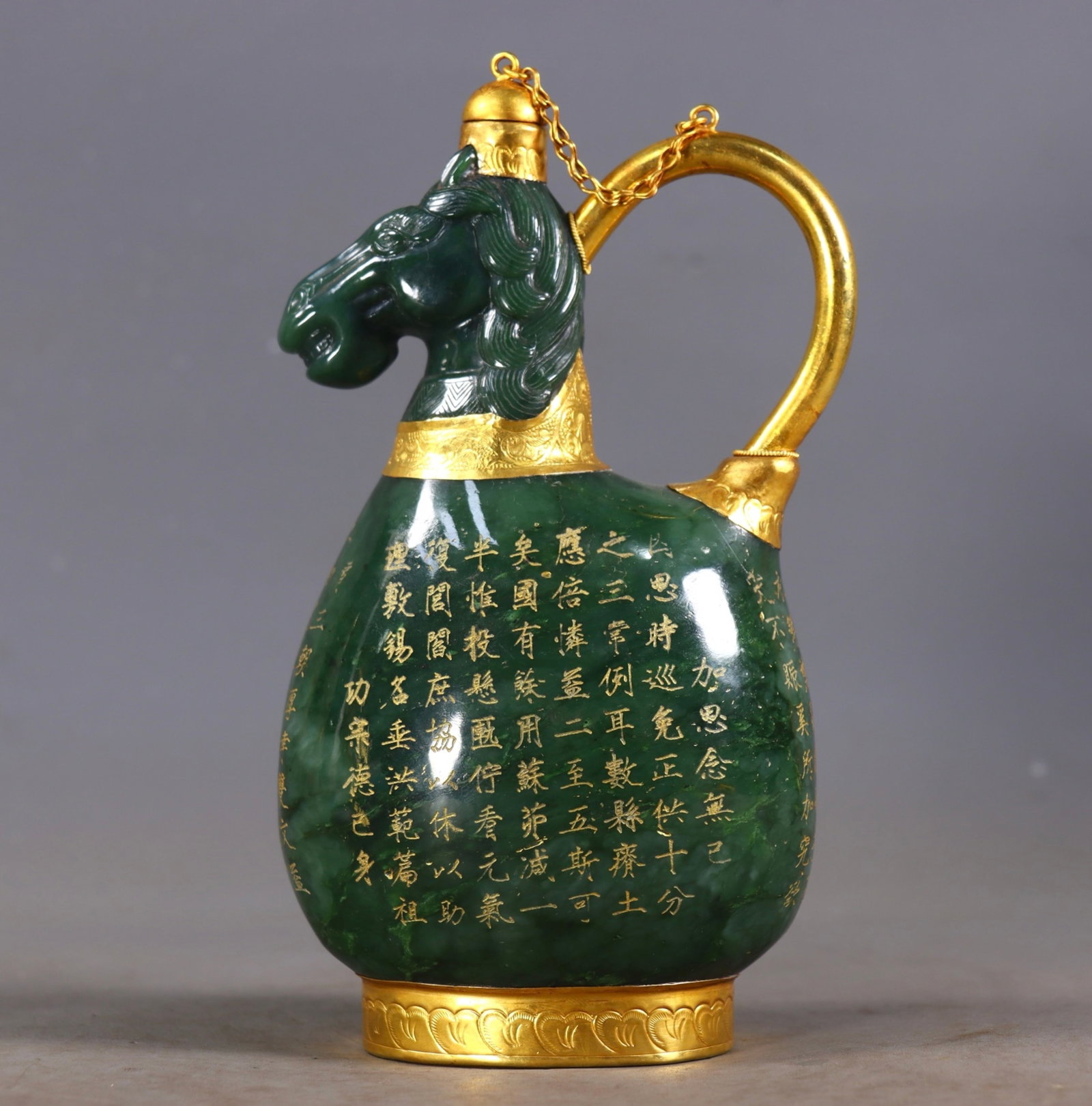 An Exquisite Jasper Cover with Gold Horse-head Pot,With Poem: Estimated Value:9000-18000 An Exquisite Jasper Cover with Gold Horse-head Pot,With Poem,Qing Dynasty,China,Qianlong Four-character Mark,Size:7.5inx3.5inx2.4in,Weight:829g