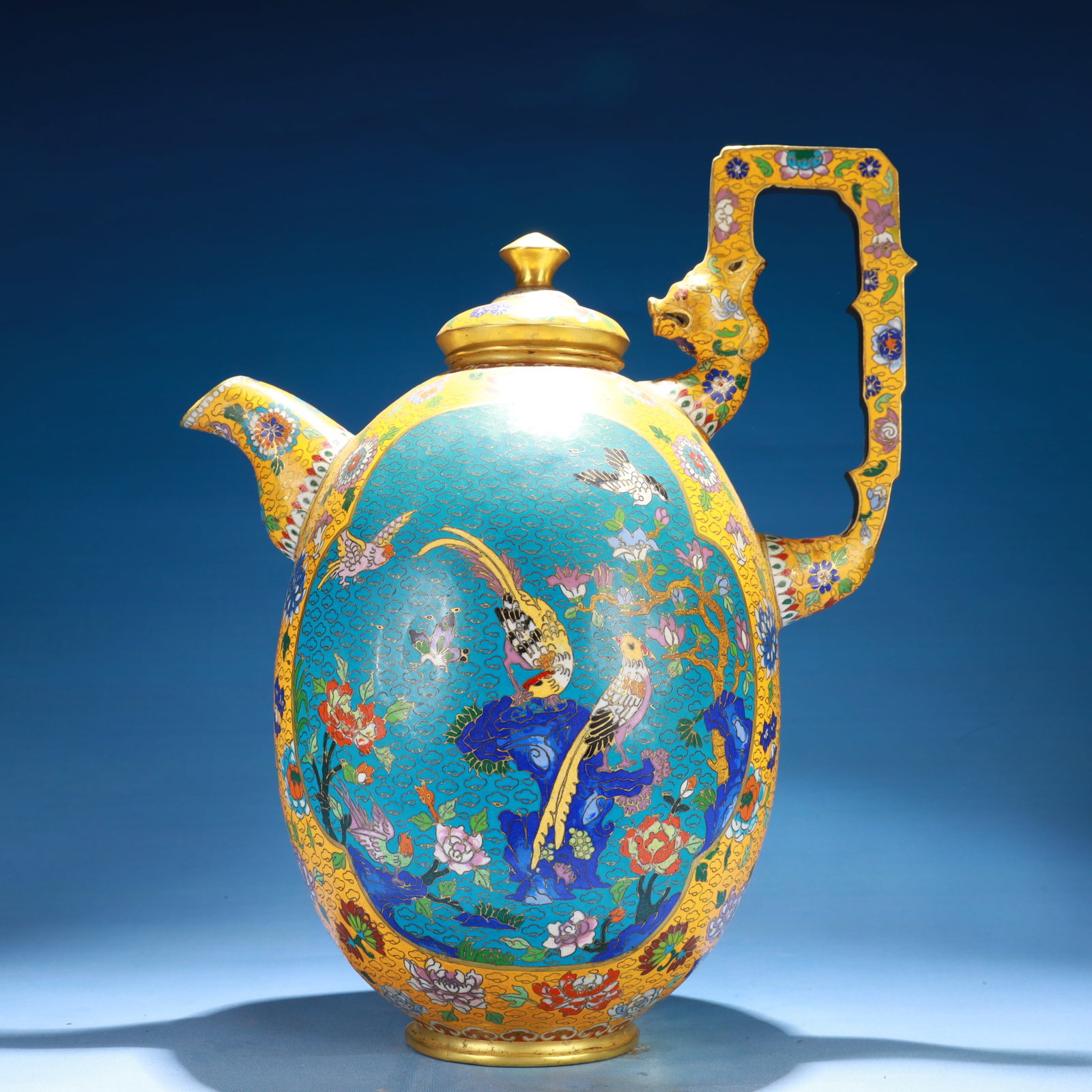 An Exquisite Cloisonne Flower and Bird Pattern Teapot: Estimated Value:5200-10000 An Exquisite Cloisonne Flower and Bird Pattern Teapot,Qing Dynasty,China,Qianlong Four-character Mark,Size:12.2inx7.5inx15.7in,Weight:7850g