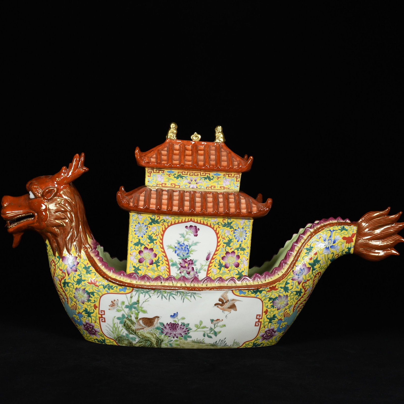 A Huge Famille-Rose Painted Gold Flower and Bird Pattern Dragon boat Ornament: Estimated Value:3600-7500 A Huge Famille-Rose Painted Gold Flower and Bird Pattern Dragon boat Ornament,Qing Dynasty,China,Qianlong Four-character Mark,Size:12.2inx22inx5.9in