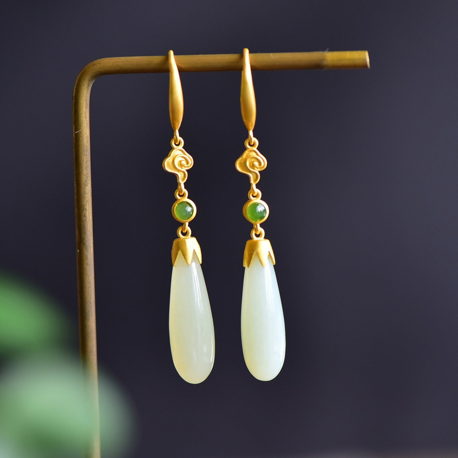 A Pair of Exquisite Sterling Silver-Gold Plated Inlaid White Jade Earrings: Estimated Value:300-600 A Pair of Exquisite Sterling Silver-Gold Plated Inlaid White Jade Earrings 一对纯银镀金镶白玉耳环