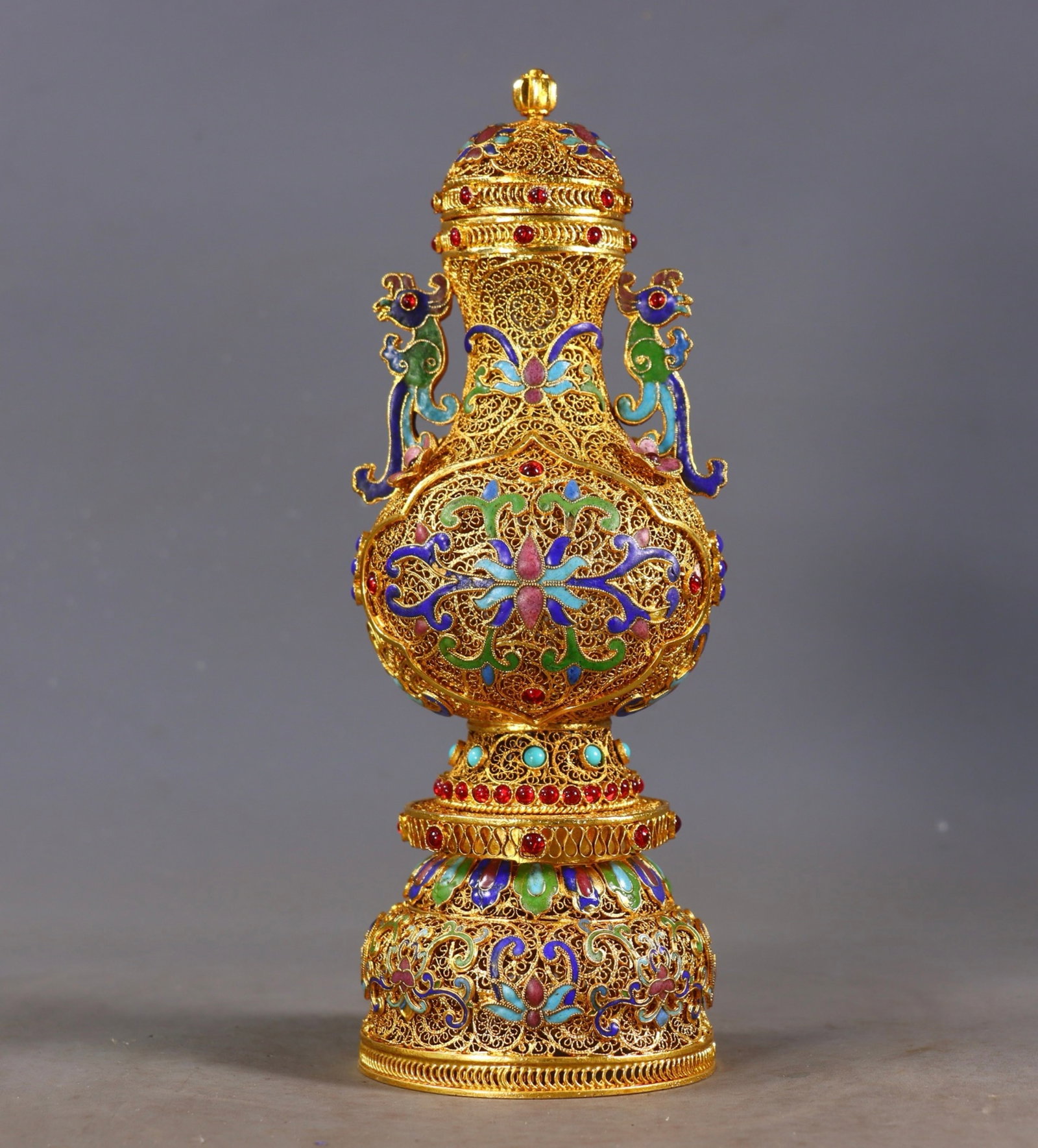 An Exquisite Filigree and Gilding Lotus Pattern Double-Ears Bottle,Inlaid Turquoise and Gems: Estimated Value:2000-4000 An Exquisite Filigree and Gilding Lotus Pattern Double-Ears Bottle,Inlaid Turquoise and Gems,Qing Dynasty,China,Qianlong Four-character Mark,Size:9.4inx3.3in,Weight:493g !