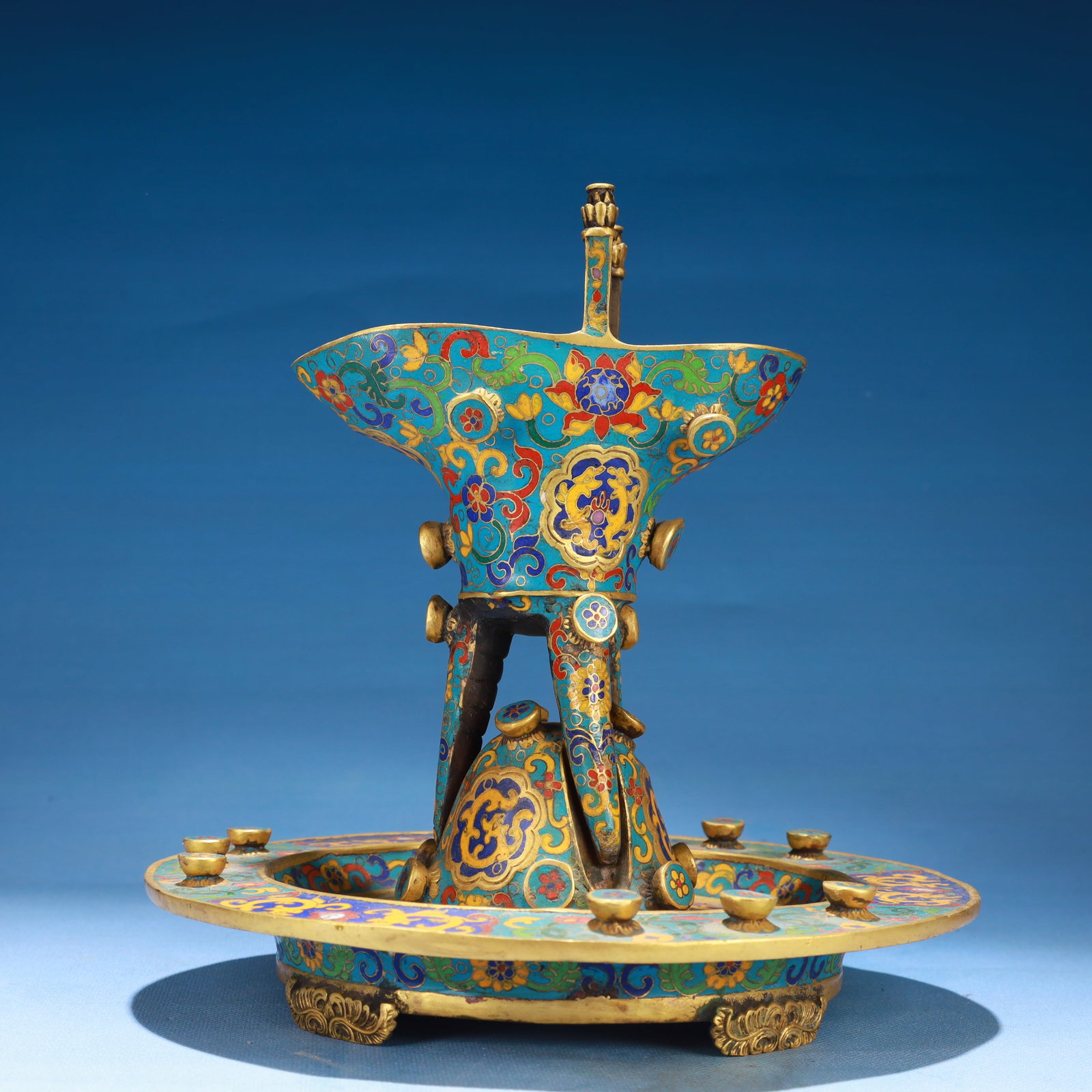 An Exquisite Cloisonne Lotus Pattern Tripod Libation Cup,with Base: Estimated Value:3400-6800 An Exquisite Cloisonne Lotus Pattern Tripod Libation Cup,with Base,Qing Dynasty,China,Qianlong Six-character Mark,Size:8.3inx8.7in,Weight:3100g