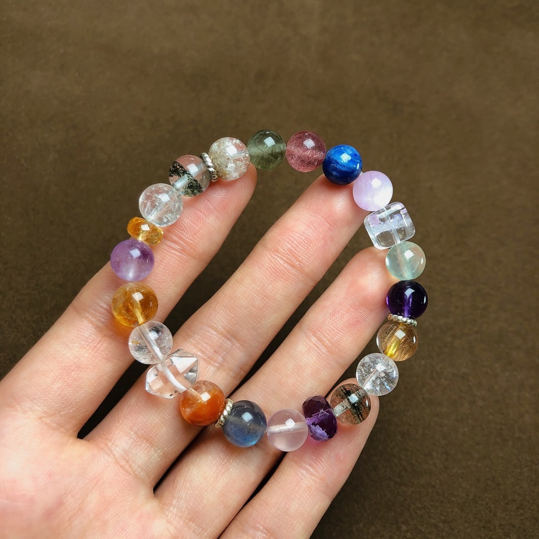 An Exquisite Multi-Gem Bracelets: Estimated Value:720-1440 An Exquisite Multi-Gem Bracelets,Size:8.2mm,8mmx8mm,Weight:18.2g 多宝手串