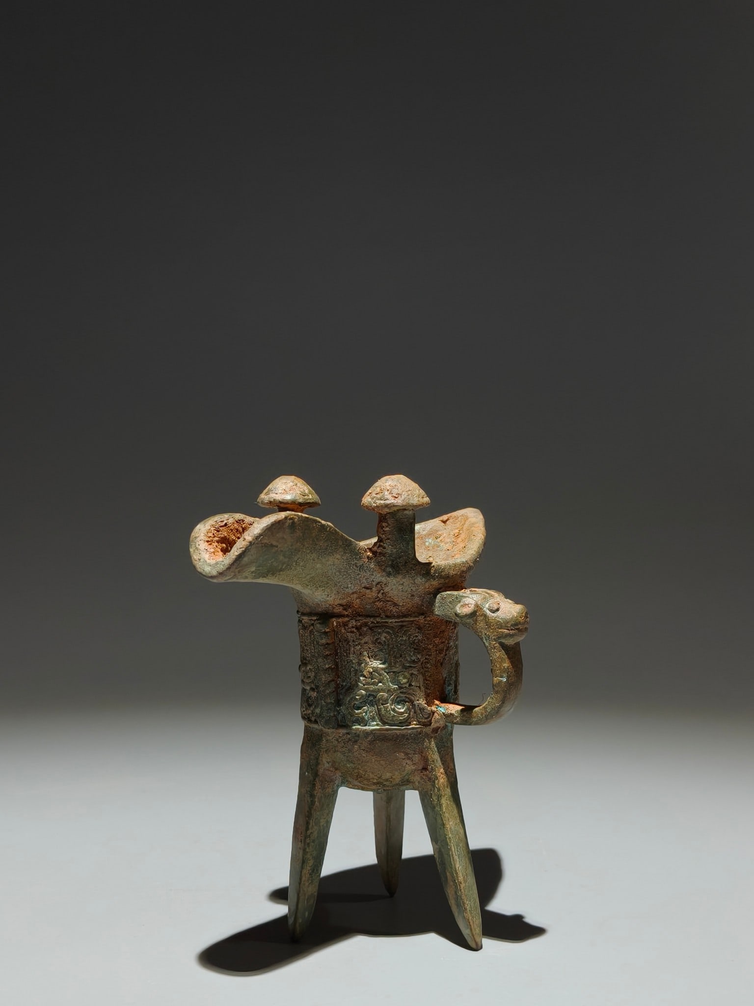 An Archaic Bronze Beast-Face Pattern Tripod Goblet - 3