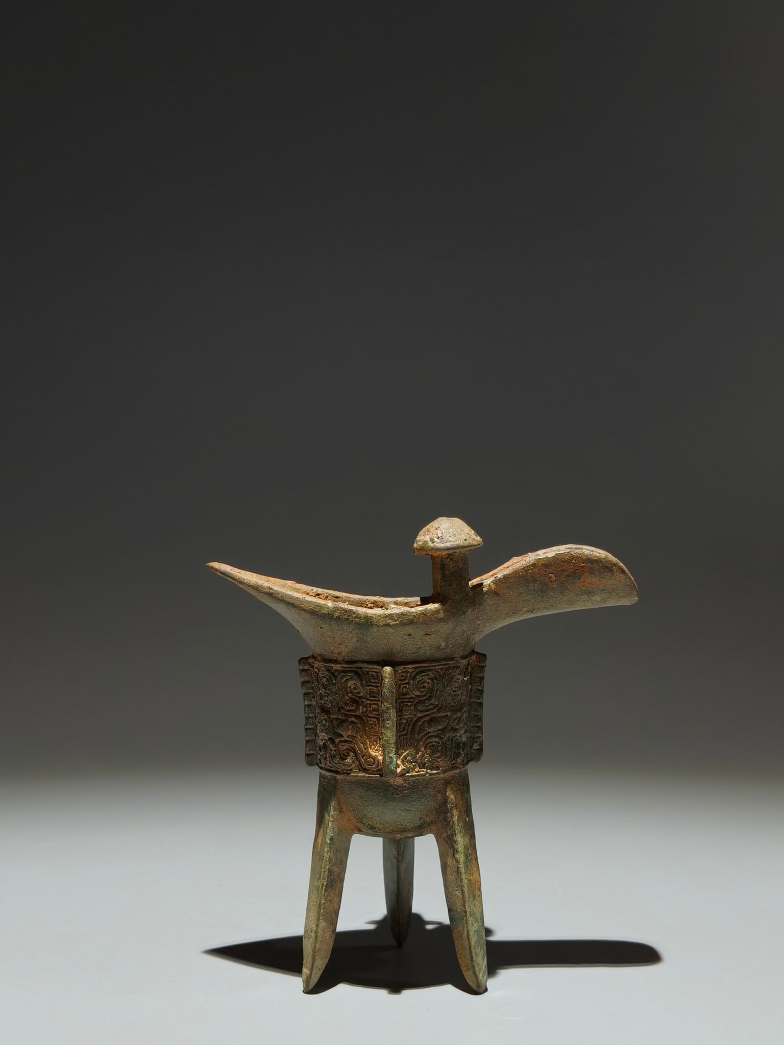 An Archaic Bronze Beast-Face Pattern Tripod Goblet - 6