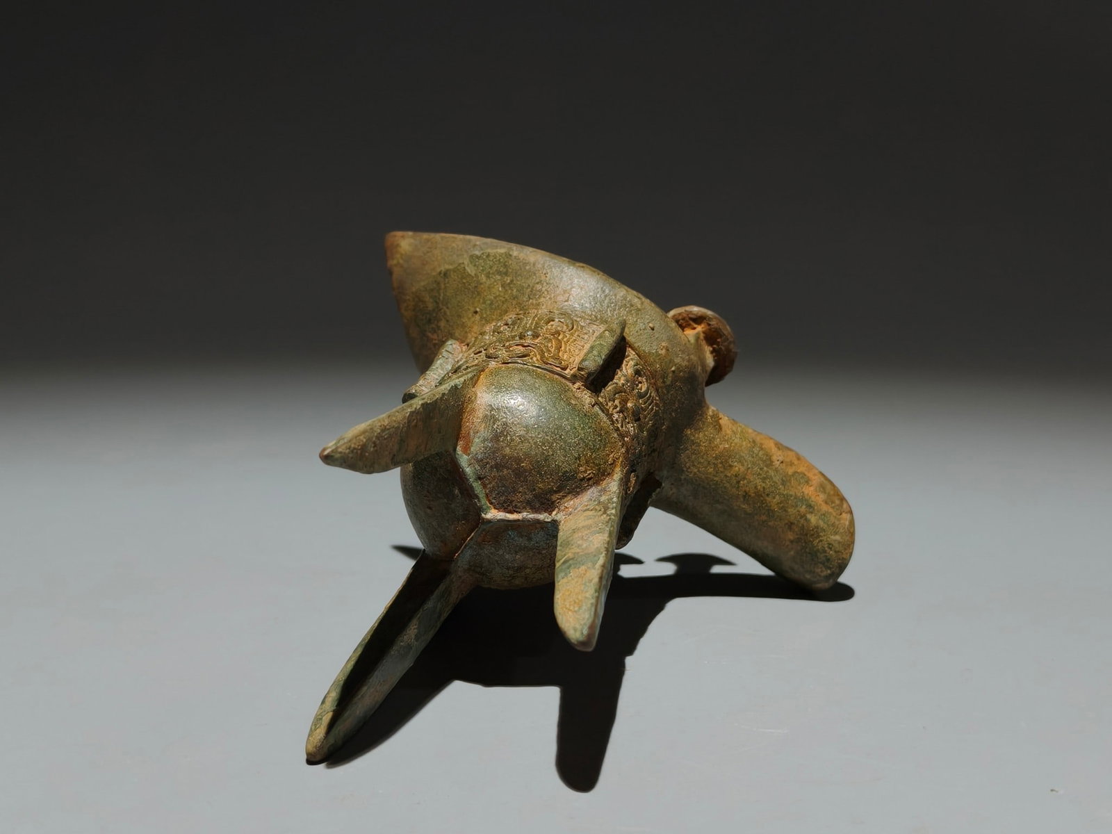 An Archaic Bronze Beast-Face Pattern Tripod Goblet - 9