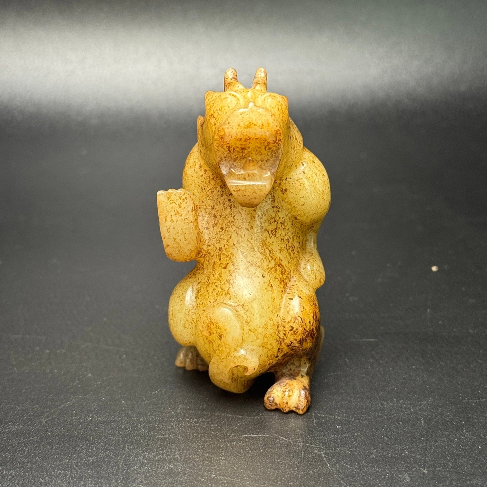 An Exquisite White Jade Auspicious Beast Hand Piece: Estimated Value:1400-2800 An Exquisite White Jade Auspicious Beast Hand Piece,Qing Dynasty,China,Size:66mmx33mmx35mm,Weight:99g