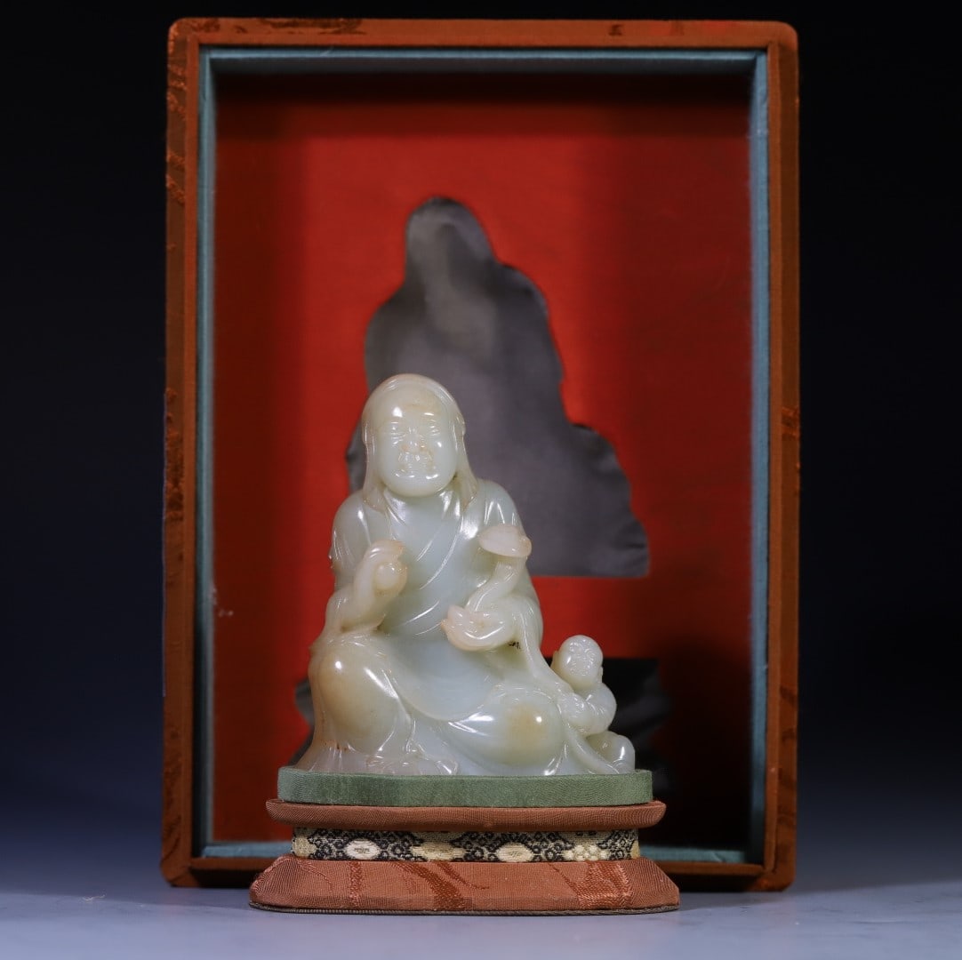 A Exquisite Hotan Jade Arhat Statue Ornament: A Exquisite Hotan Jade Arhat Statue Ornament,Qing Dynasty, China,Size:3.9inx3.1inx1.5in,Weight:339g 和田玉罗汉摆件,中国清代