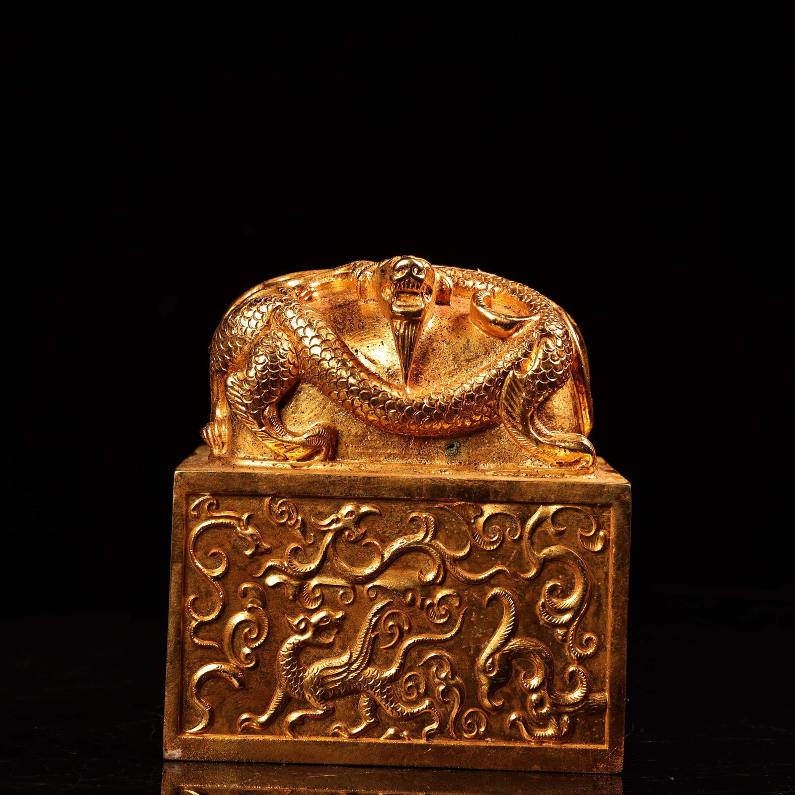 A Exquisite Gilt Bronze Dragon Seal: A Exquisite Gilt Bronze Dragon Seal,Qing Dynasty, China,Size:3.5inx3.1in ,Weight:2900g 铜鎏金龙印章,中国清代